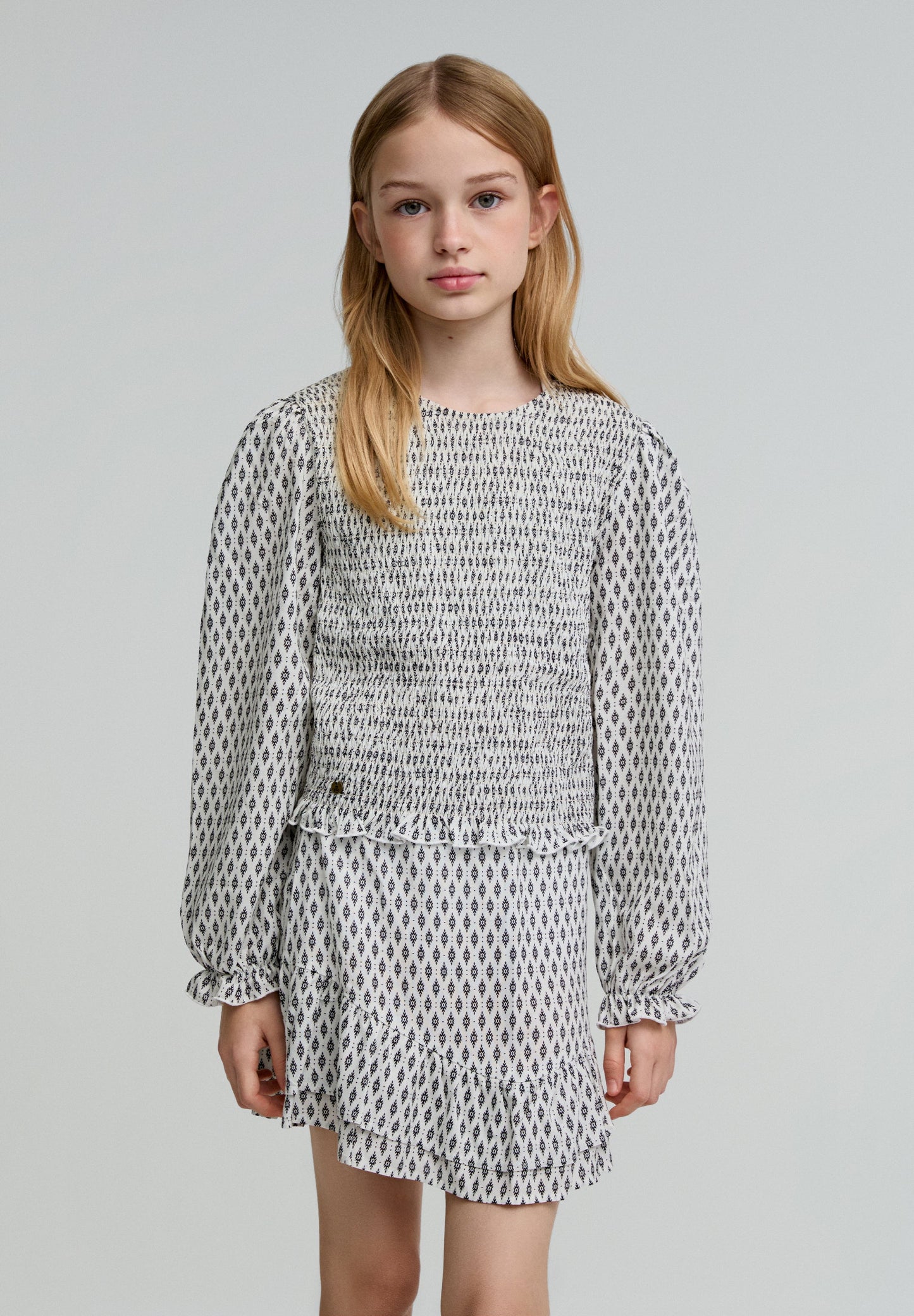 PRINTED SMOCKED BLOUSE