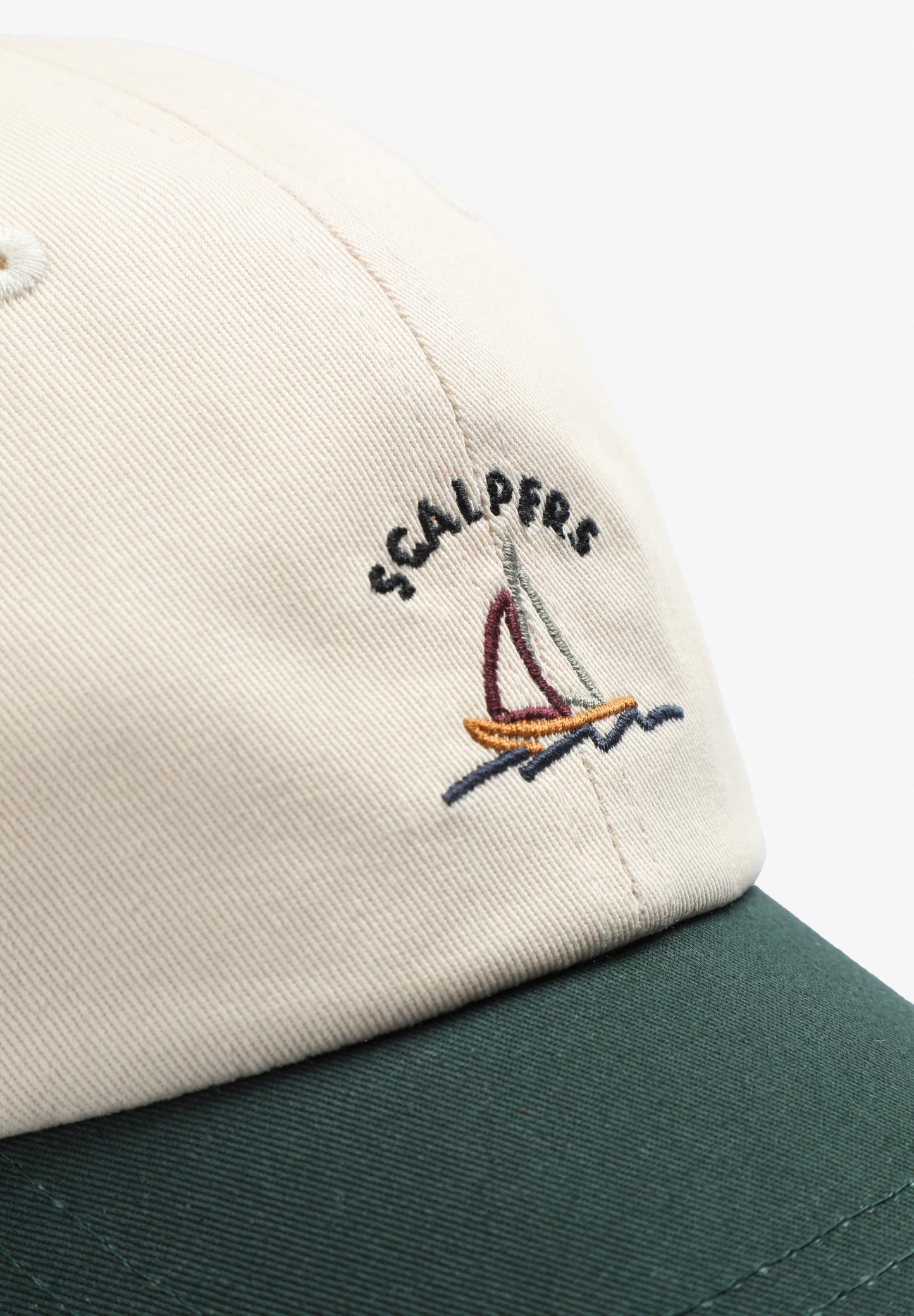 CAP EMBROIDERED WITH CONTRAST DETAILS