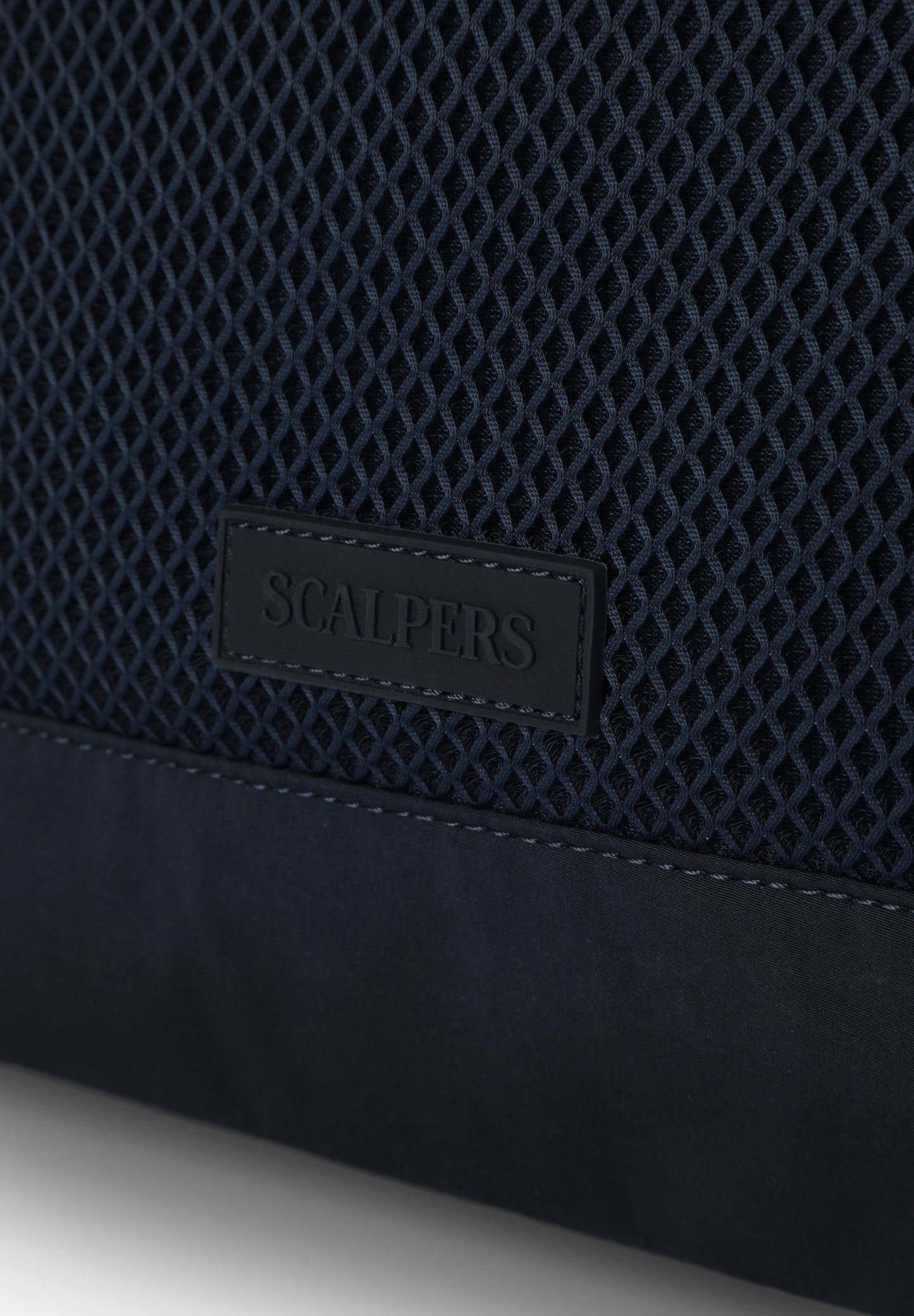 TECHNICAL BAG WITH MESH DETAILS