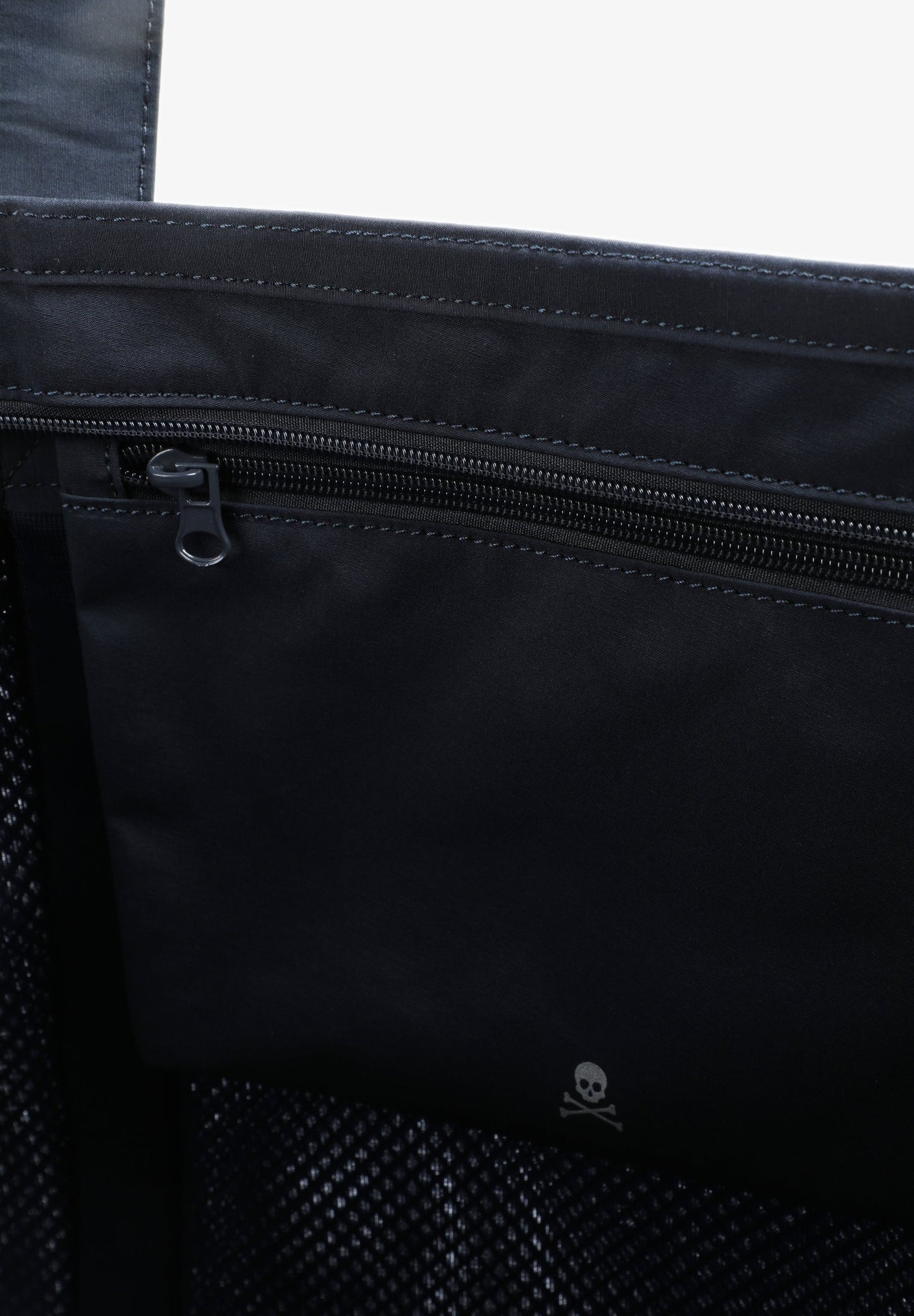 TECHNICAL BAG WITH MESH DETAILS