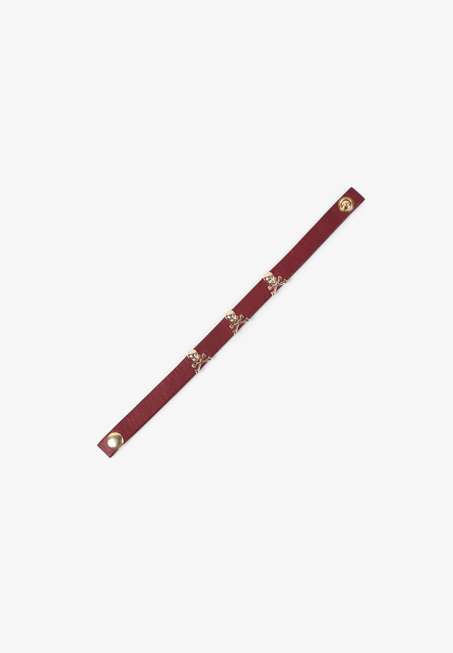 LEATHER BRACELET WITH SKULLS