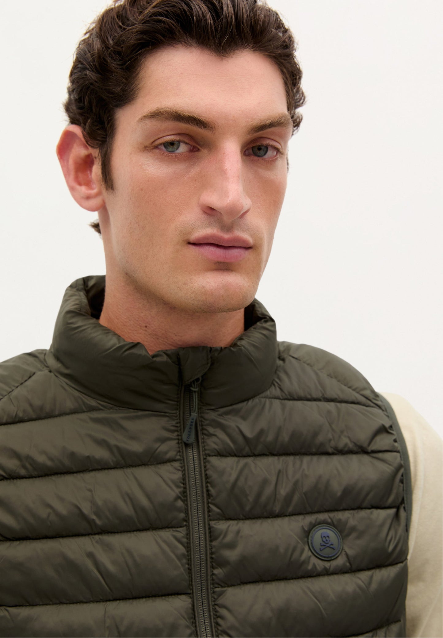 QUILTED GILET WITH SKULL