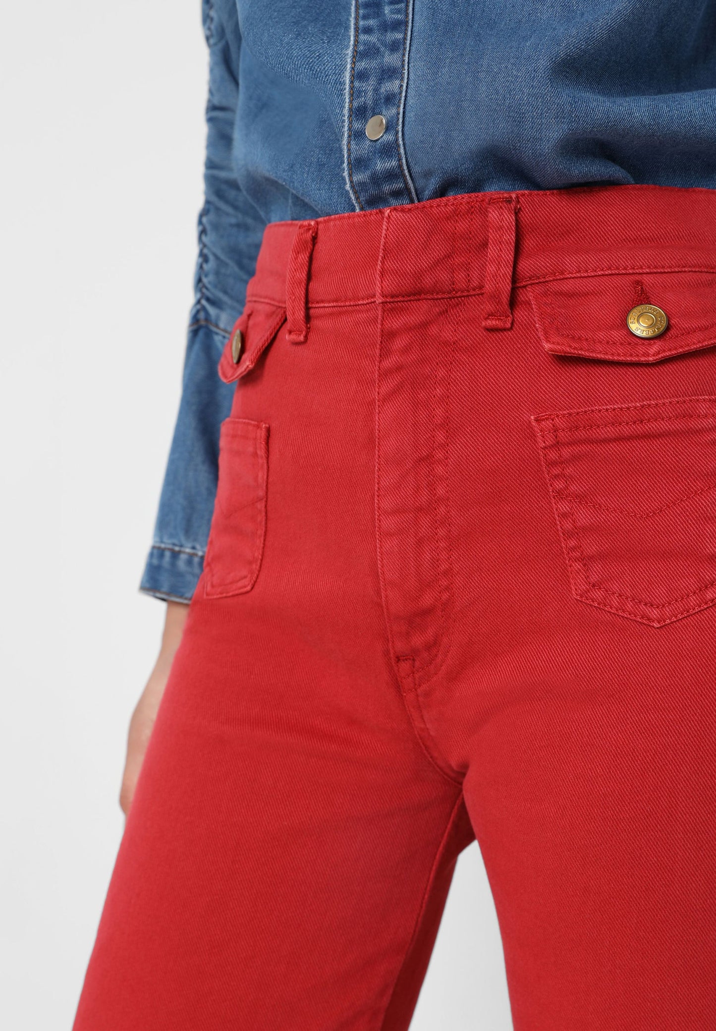 FLARE JEANS WITH BUTTON POCKETS