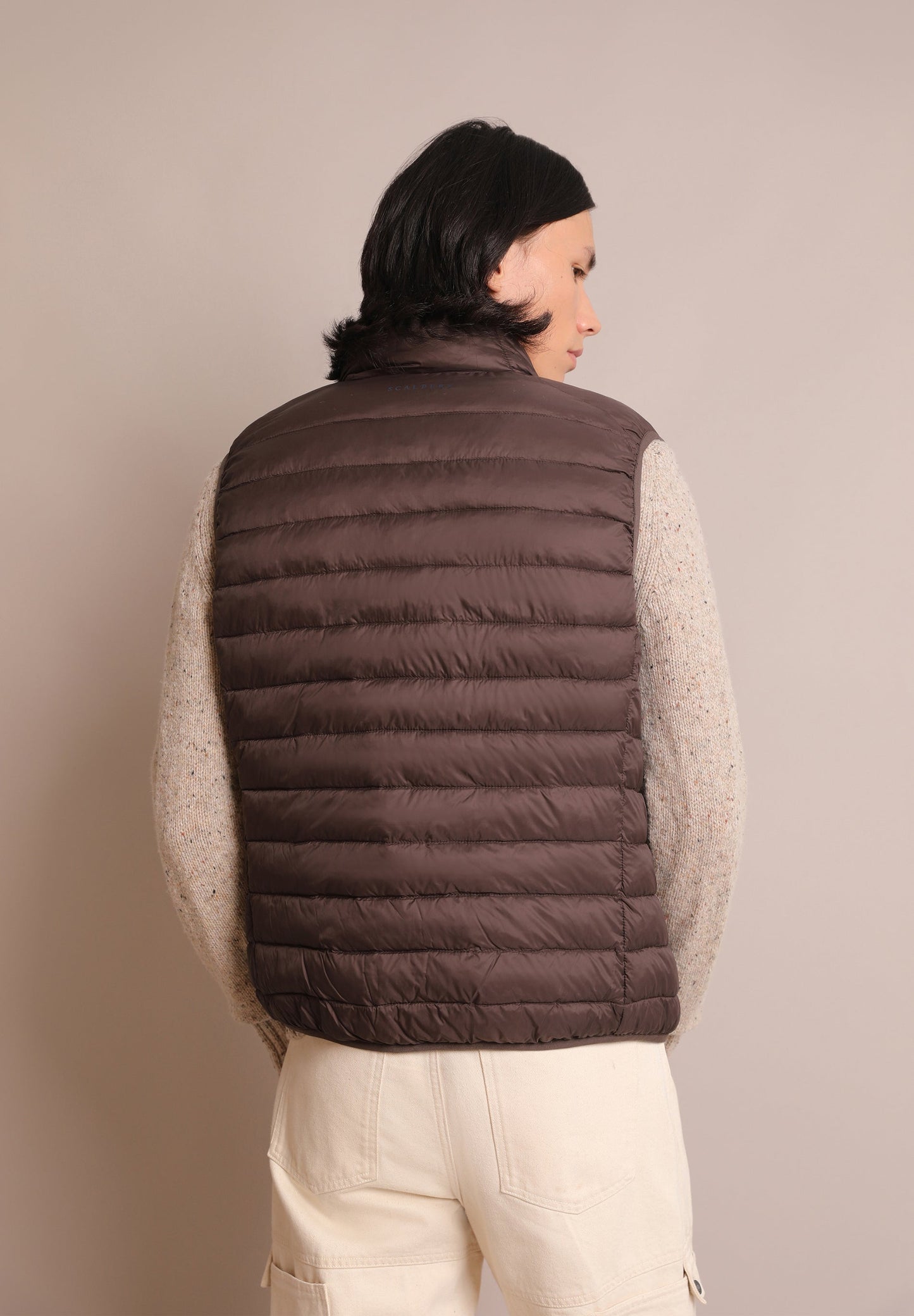 QUILTED GILET WITH SKULL DETAIL