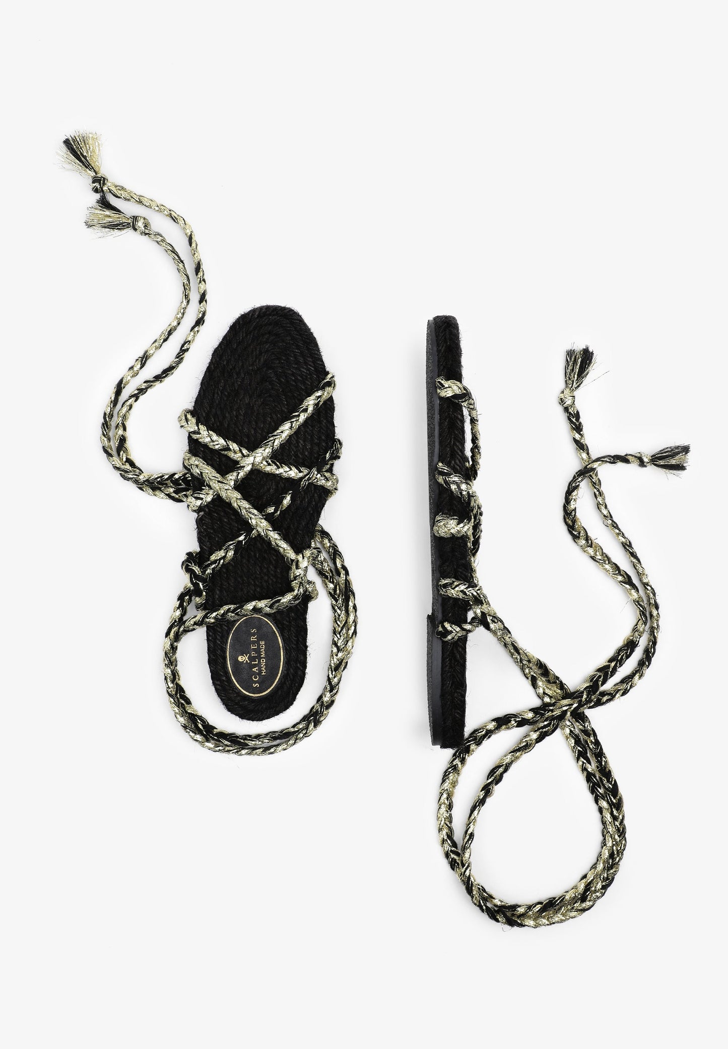 FLAT SANDALS TIED WITH BRAIDED CORDS