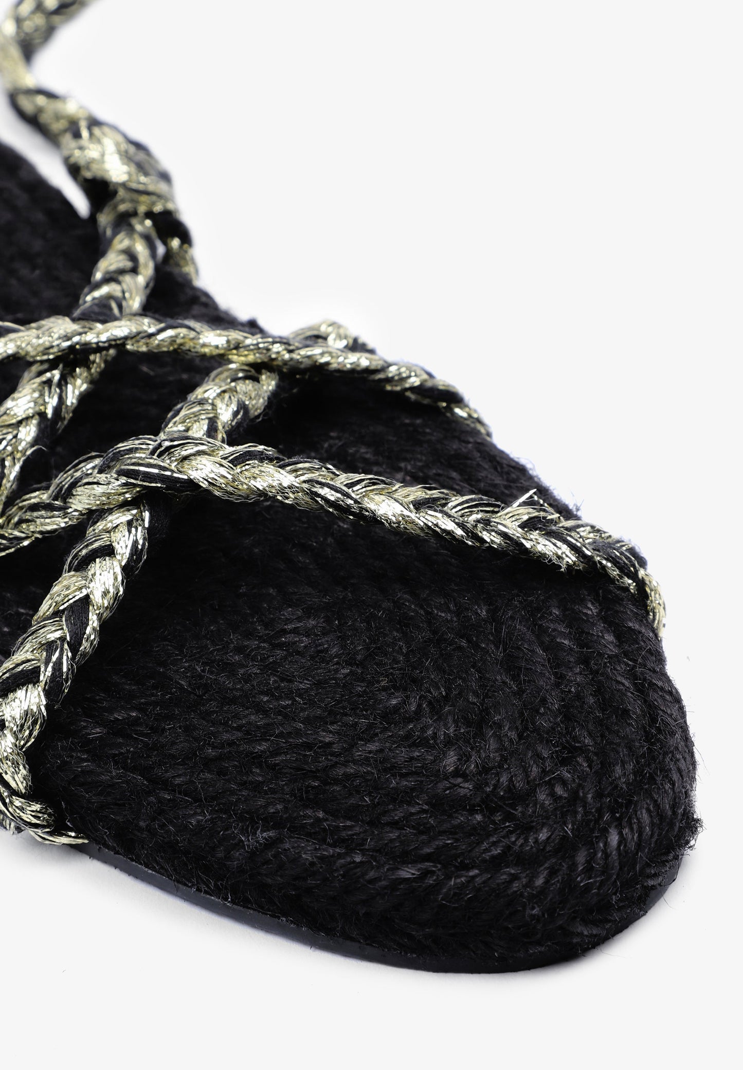 FLAT SANDALS TIED WITH BRAIDED CORDS