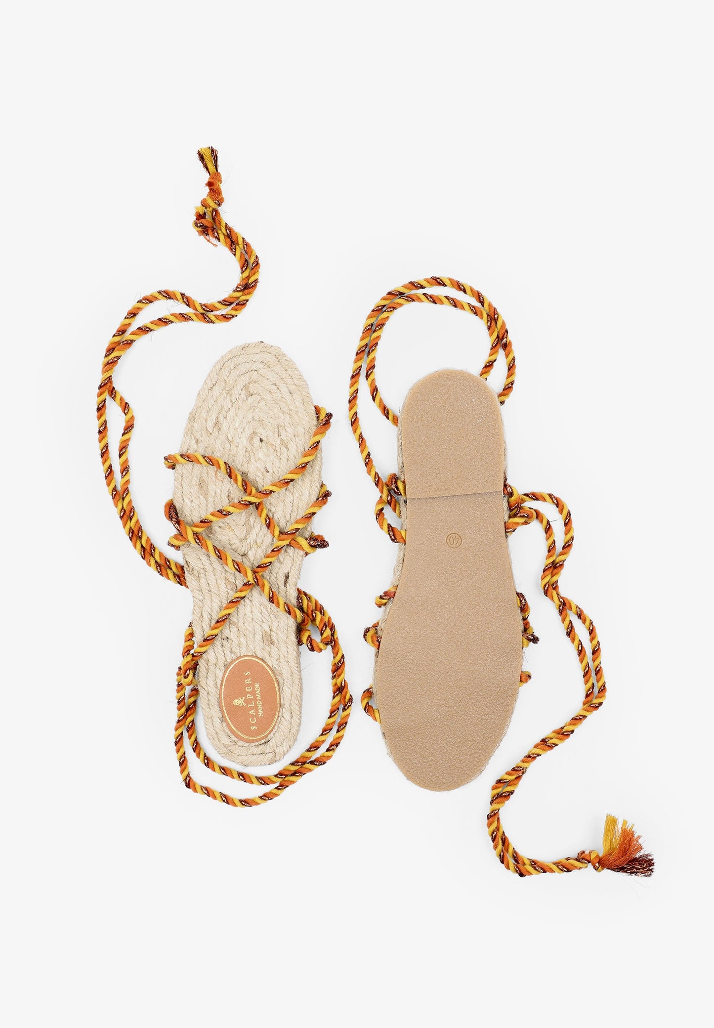 FLAT SANDALS TIED WITH BRAIDED CORDS