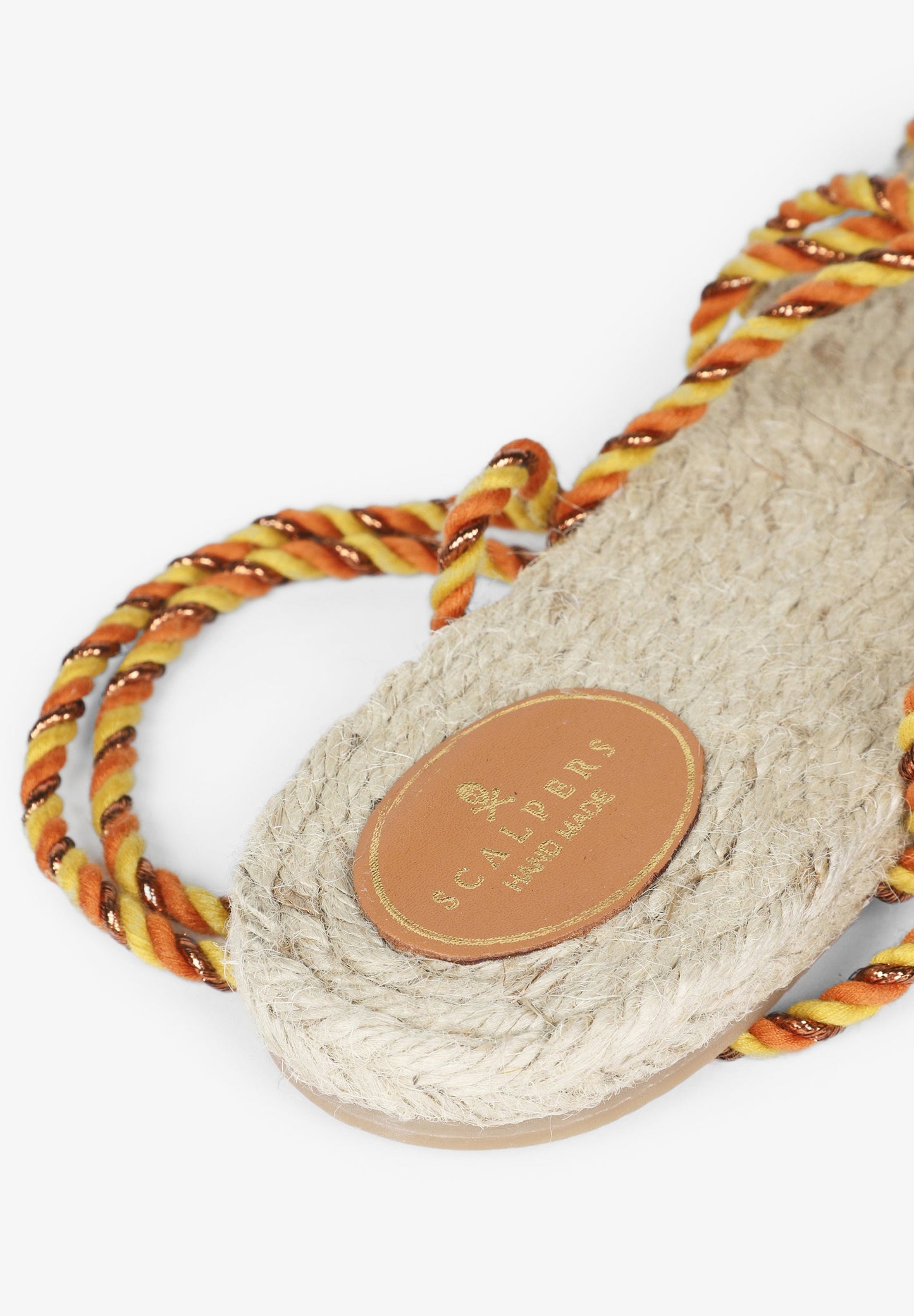 FLAT SANDALS TIED WITH BRAIDED CORDS