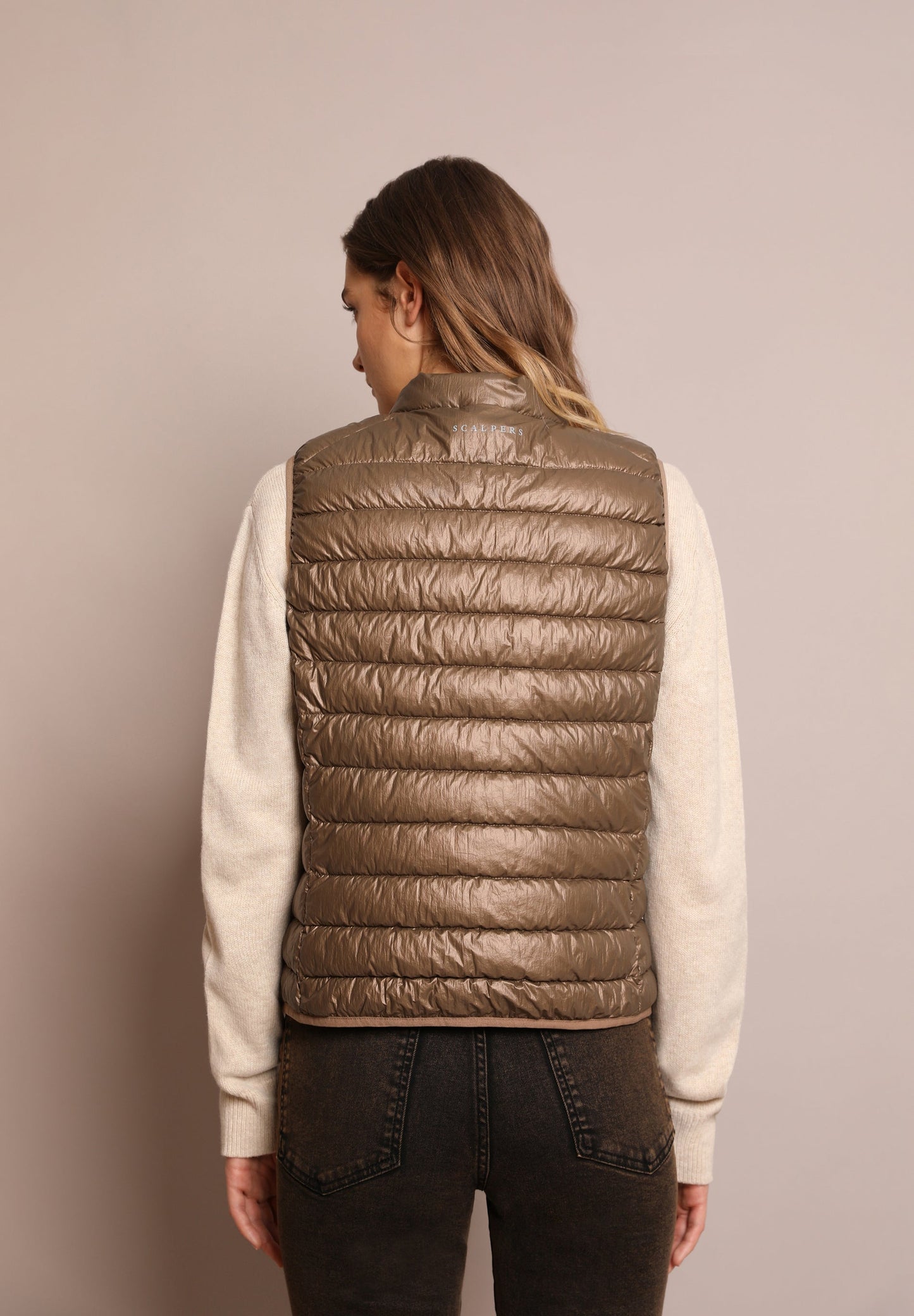 QUILTED GILET WITH SKULL DETAIL