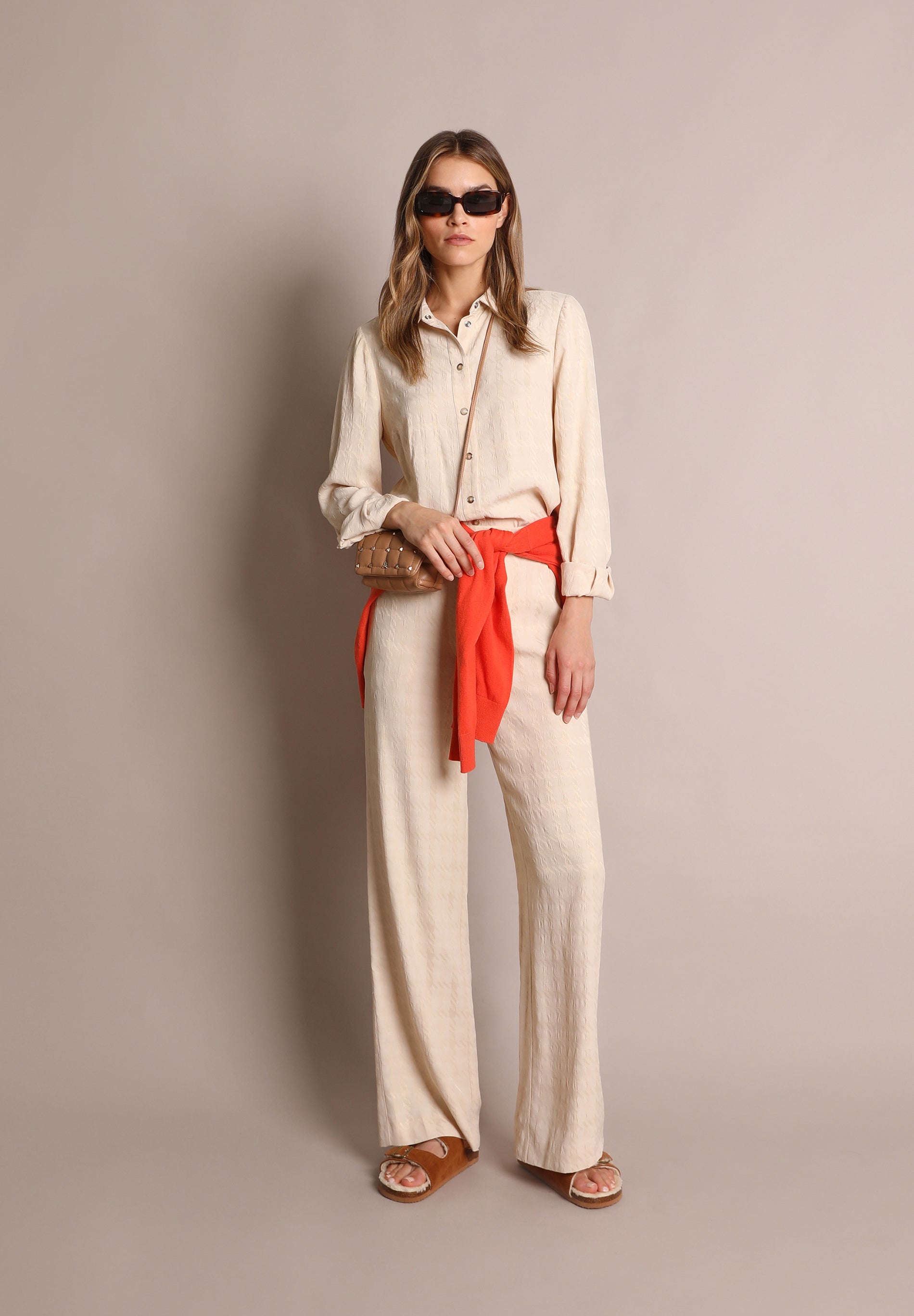 LOOSE-FITTING FLARED TROUSERS