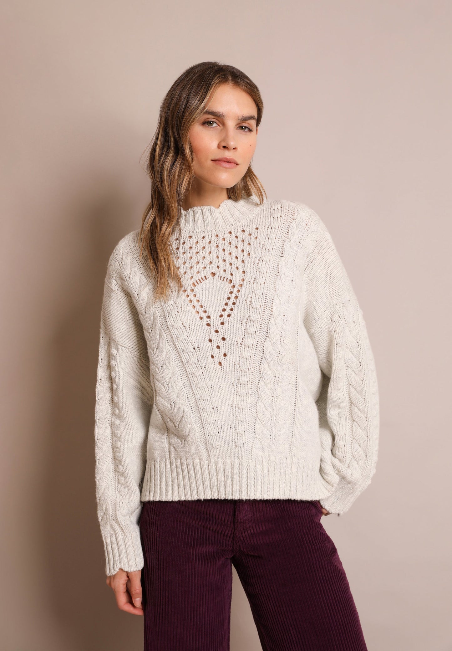 CABLE-KNIT SWEATER
