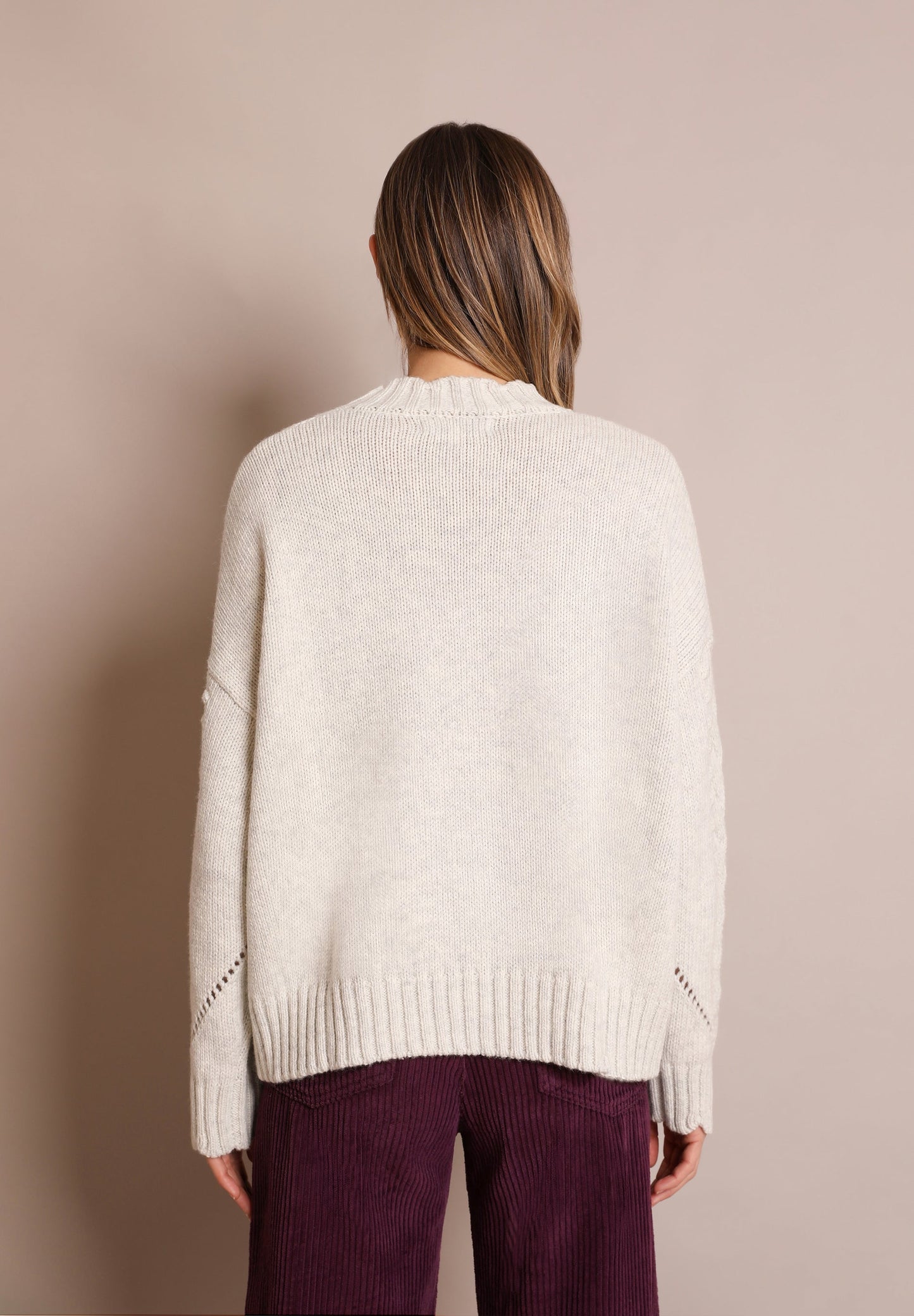 CABLE-KNIT SWEATER