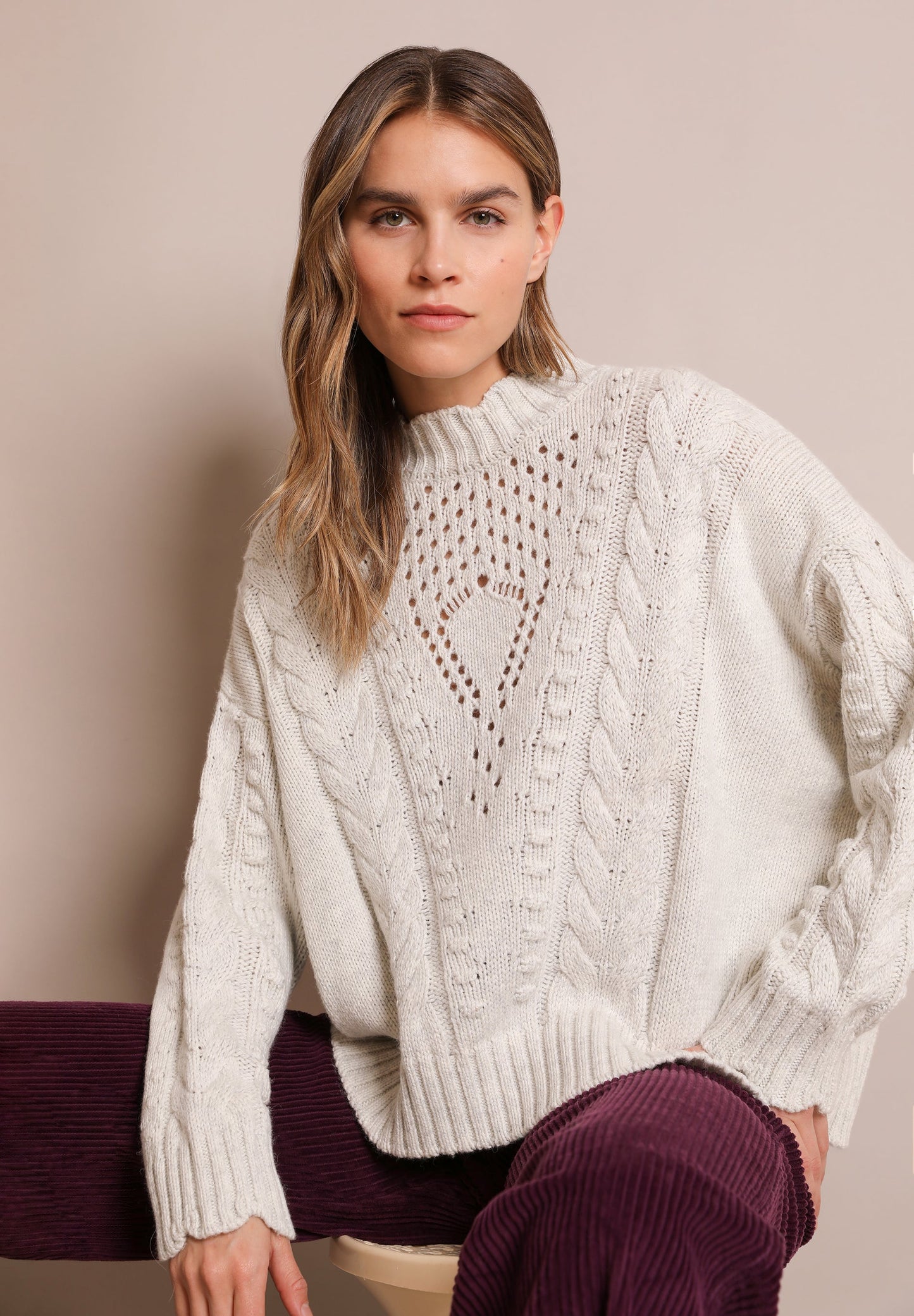 CABLE-KNIT SWEATER