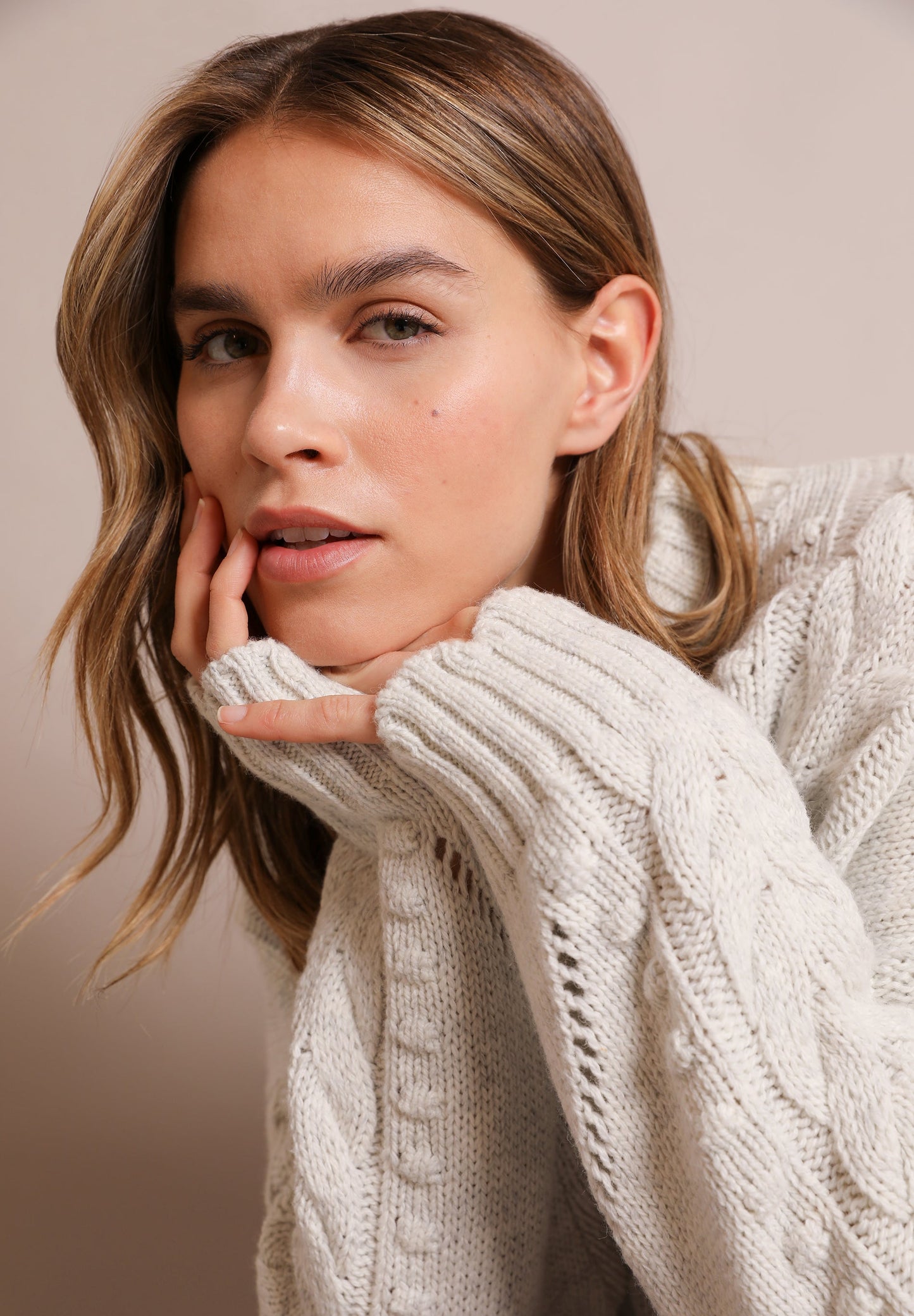 CABLE-KNIT SWEATER