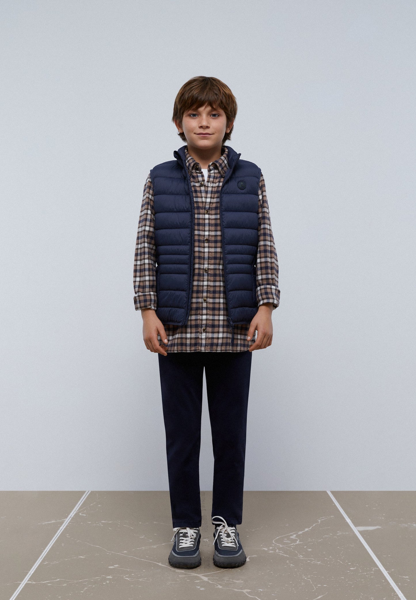 QUILTED GILET WITH SKULL