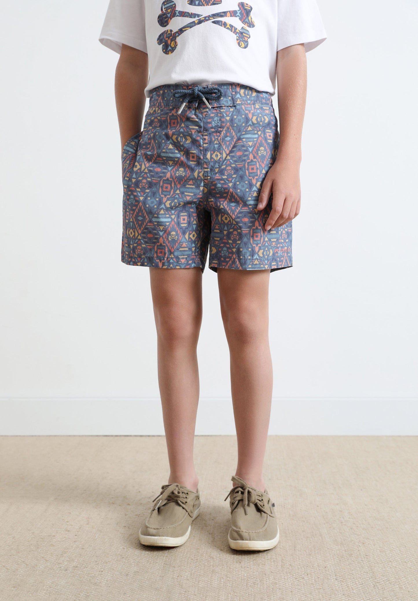 GEOMETRIC PRINT SWIMMING TRUNKS