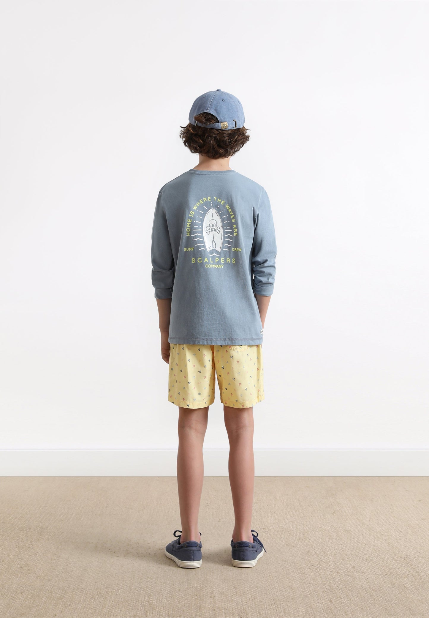 SWIMMING TRUNKS WITH ALL-OVER SKULLS