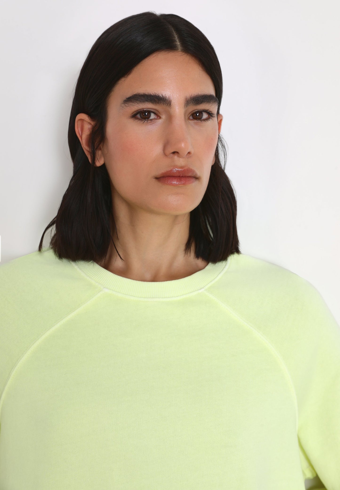 RANGLAN SLEEVE FADED SWEATSHIRT