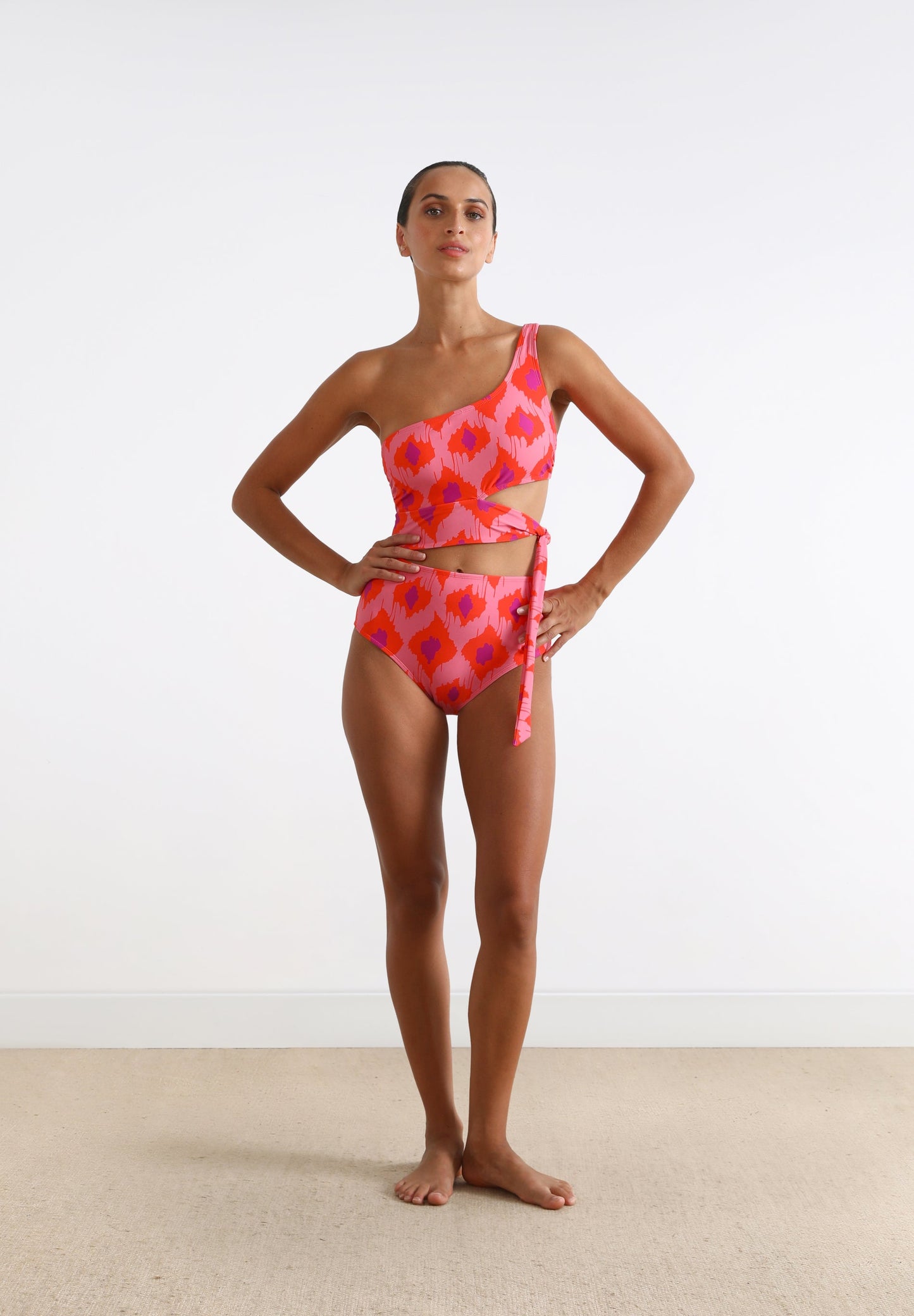 ASYMMETRIC CUT OUT SWIMSUIT
