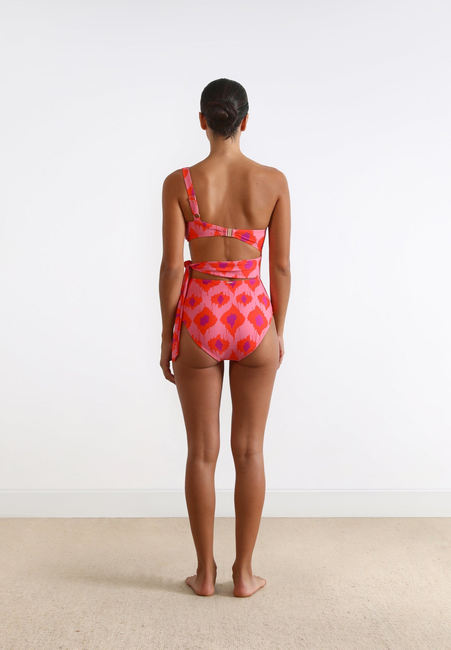 ASYMMETRIC CUT OUT SWIMSUIT