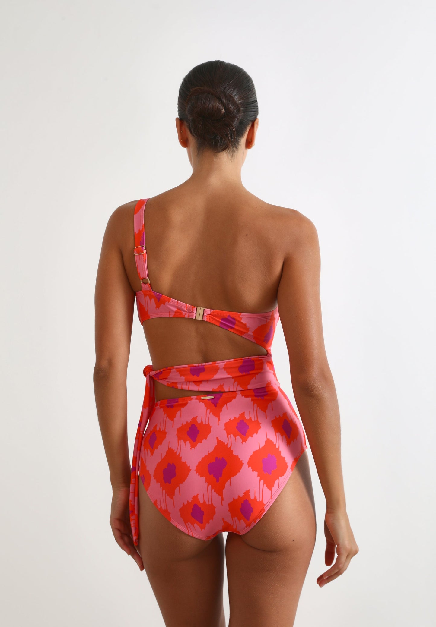 ASYMMETRIC CUT OUT SWIMSUIT