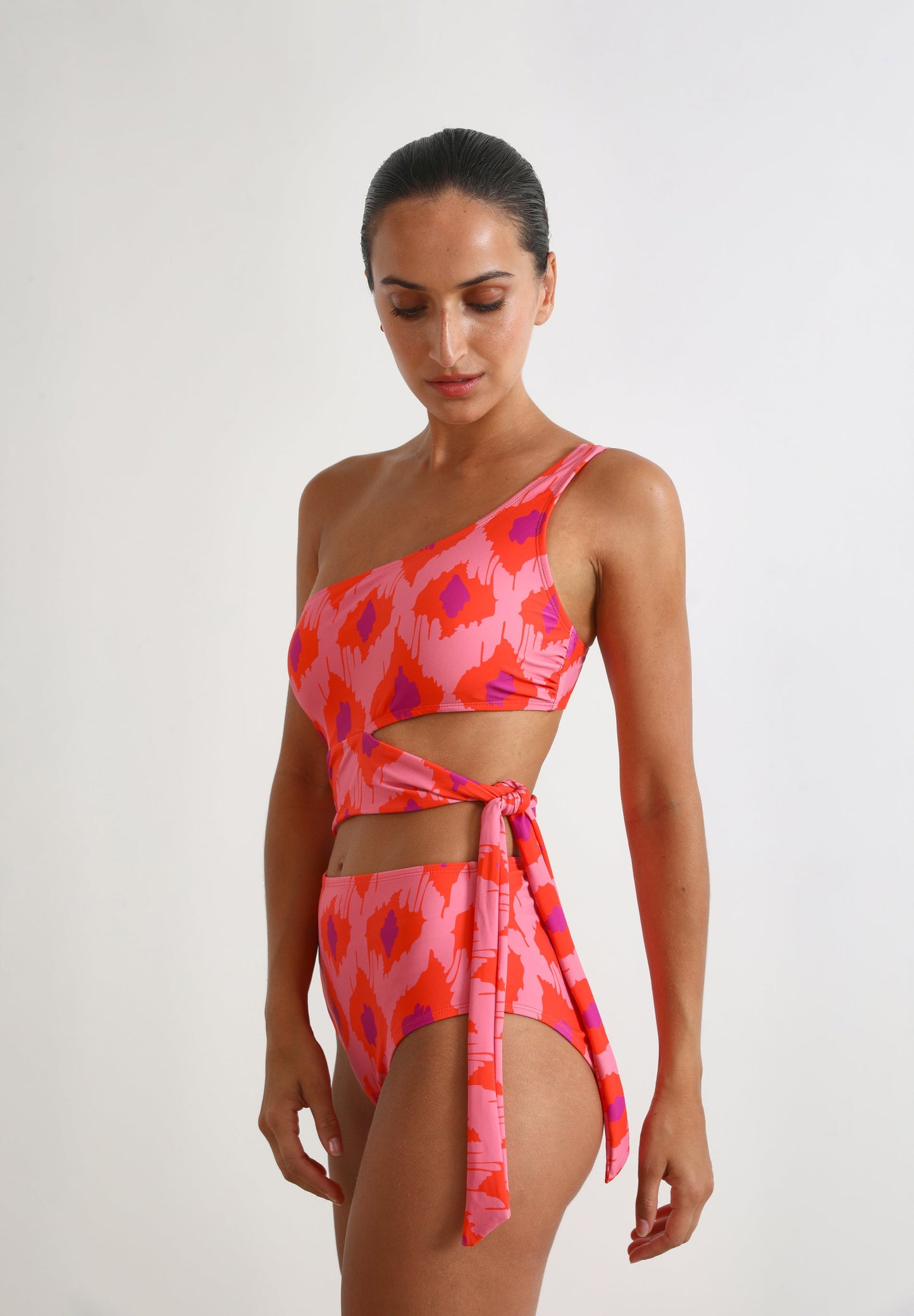 ASYMMETRIC CUT OUT SWIMSUIT