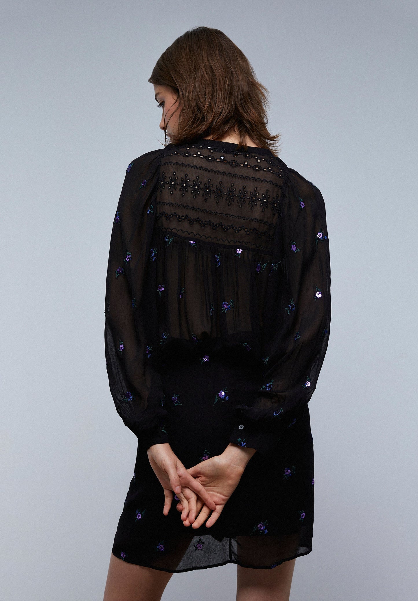 MINI SKIRT WITH KNOT AND FLORAL DETAIL