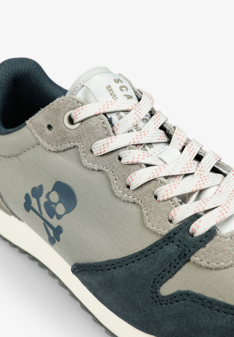 SNEAKERS WITH THREE-TONE SKULL