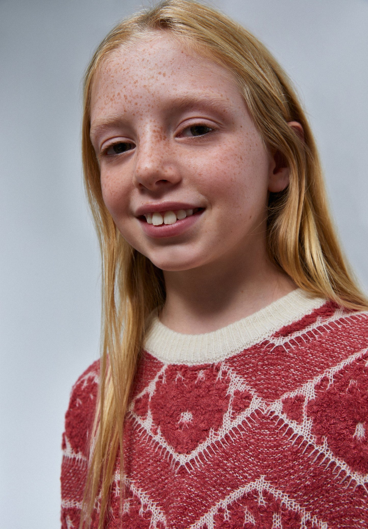 SWEATER WITH SCALLOPED DETAIL