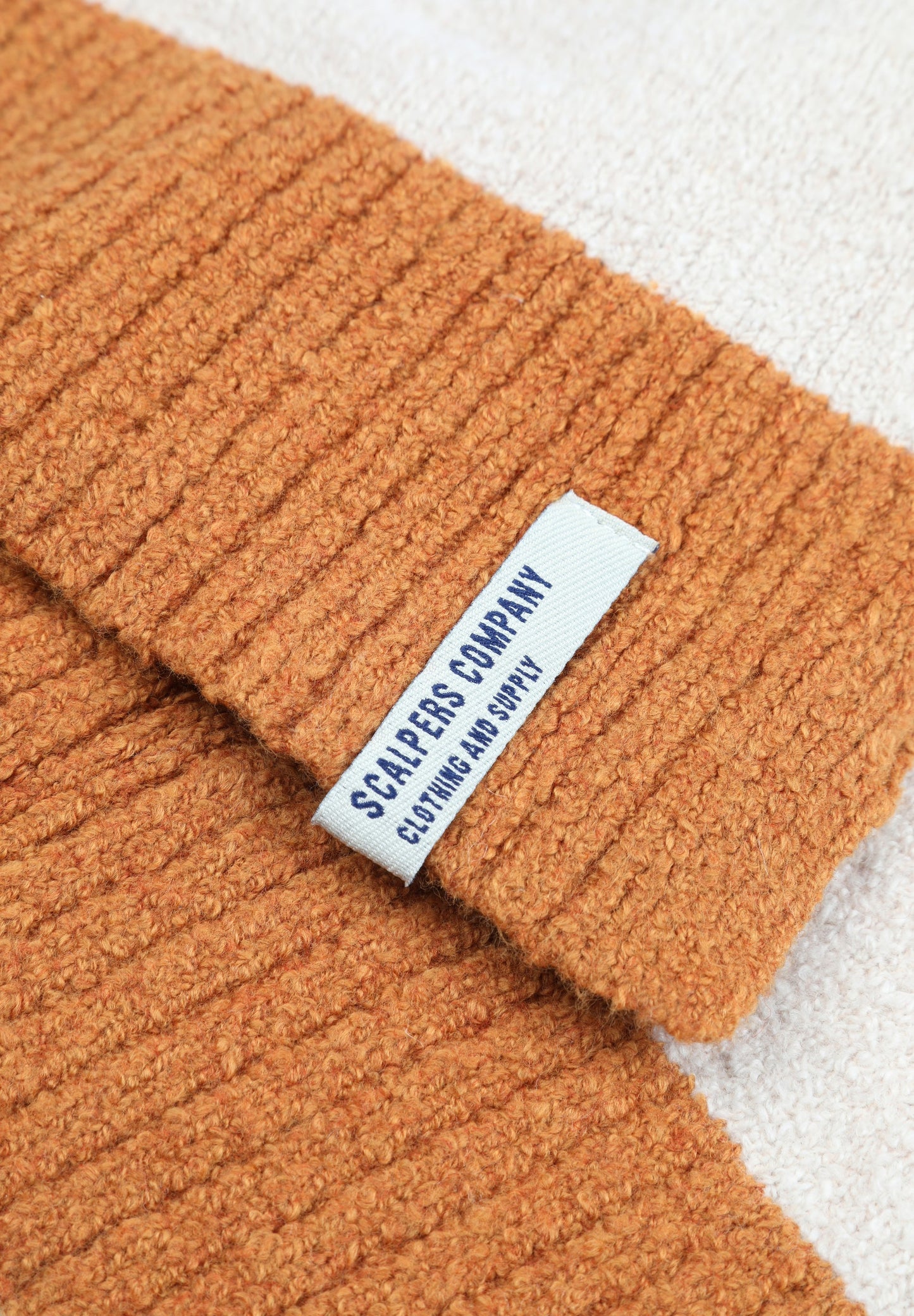 SCARF WITH TRIM DETAIL