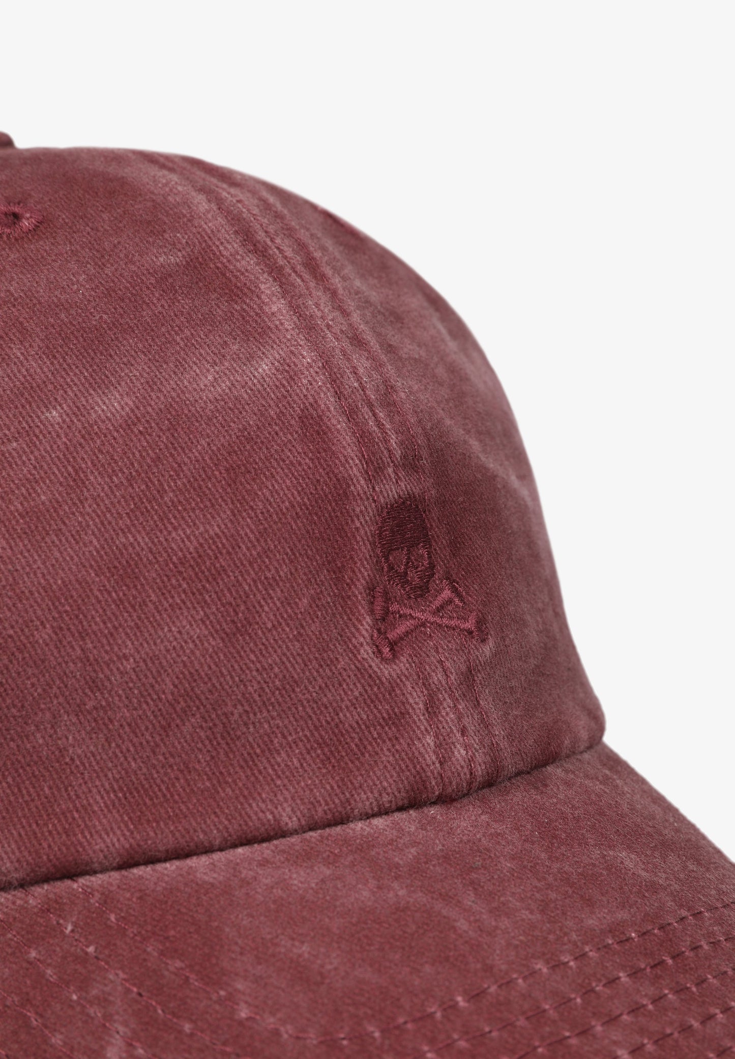 FADED CAP WITH SKULL DETAIL