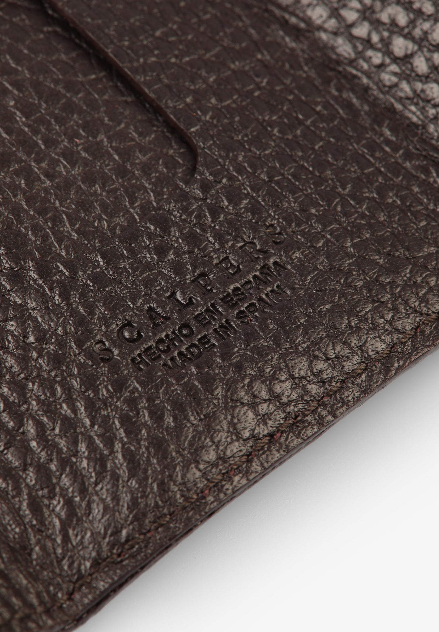 ENGRAVED LEATHER CLUTCH