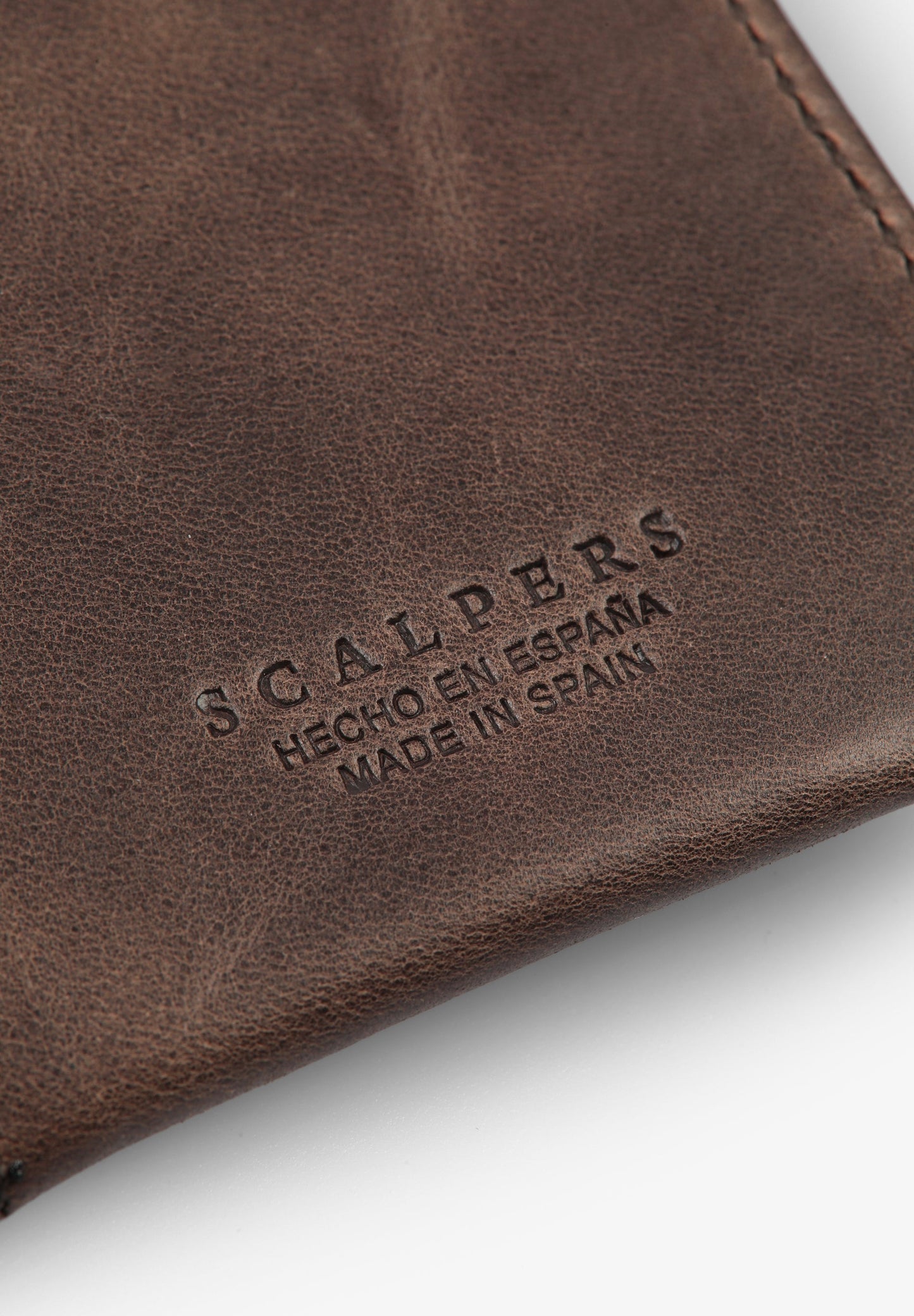 WALLET WITH ELASTIC FASTENING