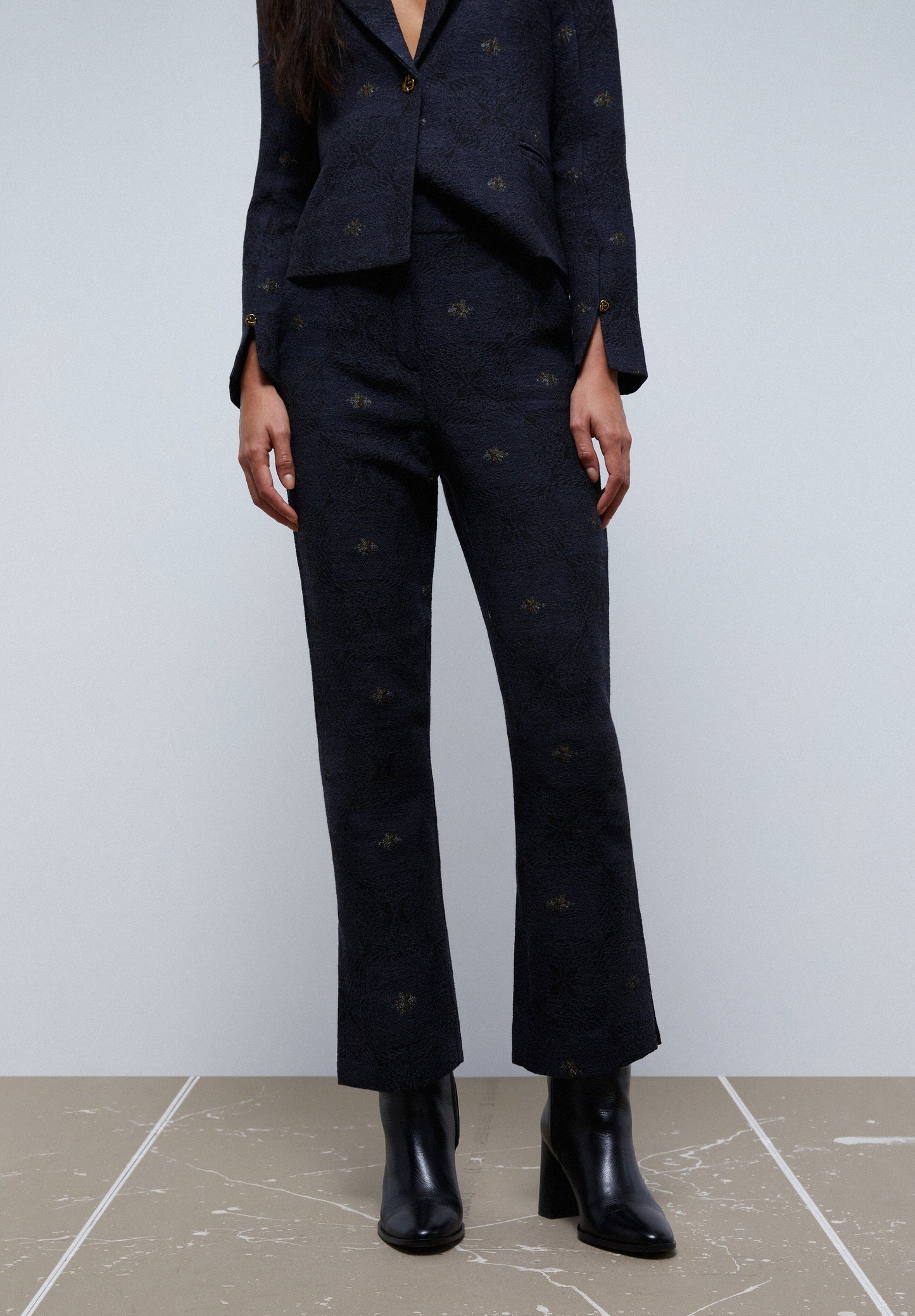 FLARE MOTIF TROUSERS