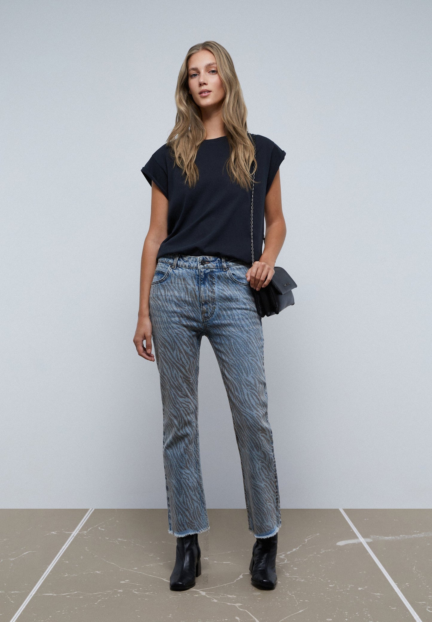 ANIMAL PRINT FLARED ANKLE JEANS