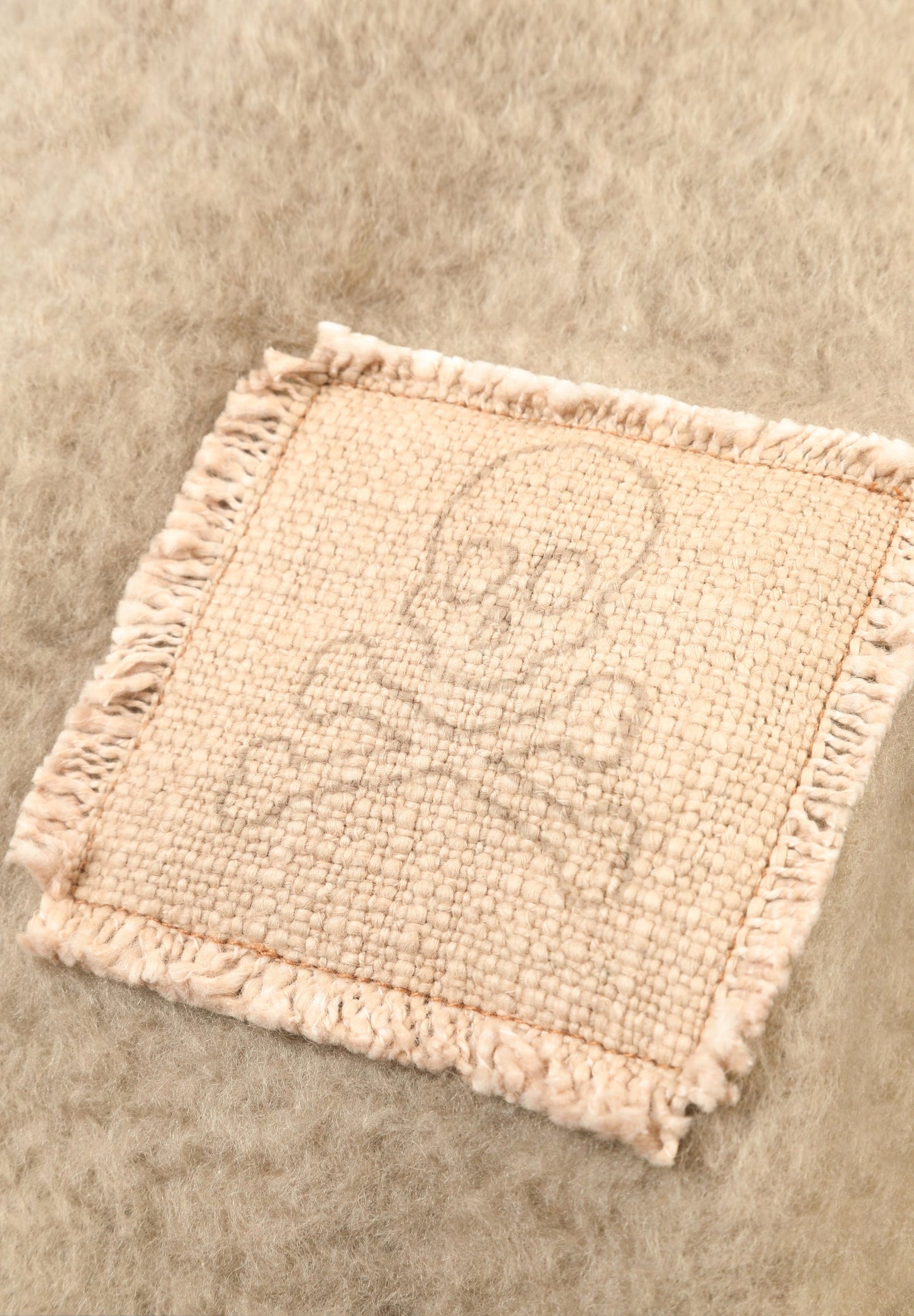 SCARF WITH SKILL PATCH DETAIL