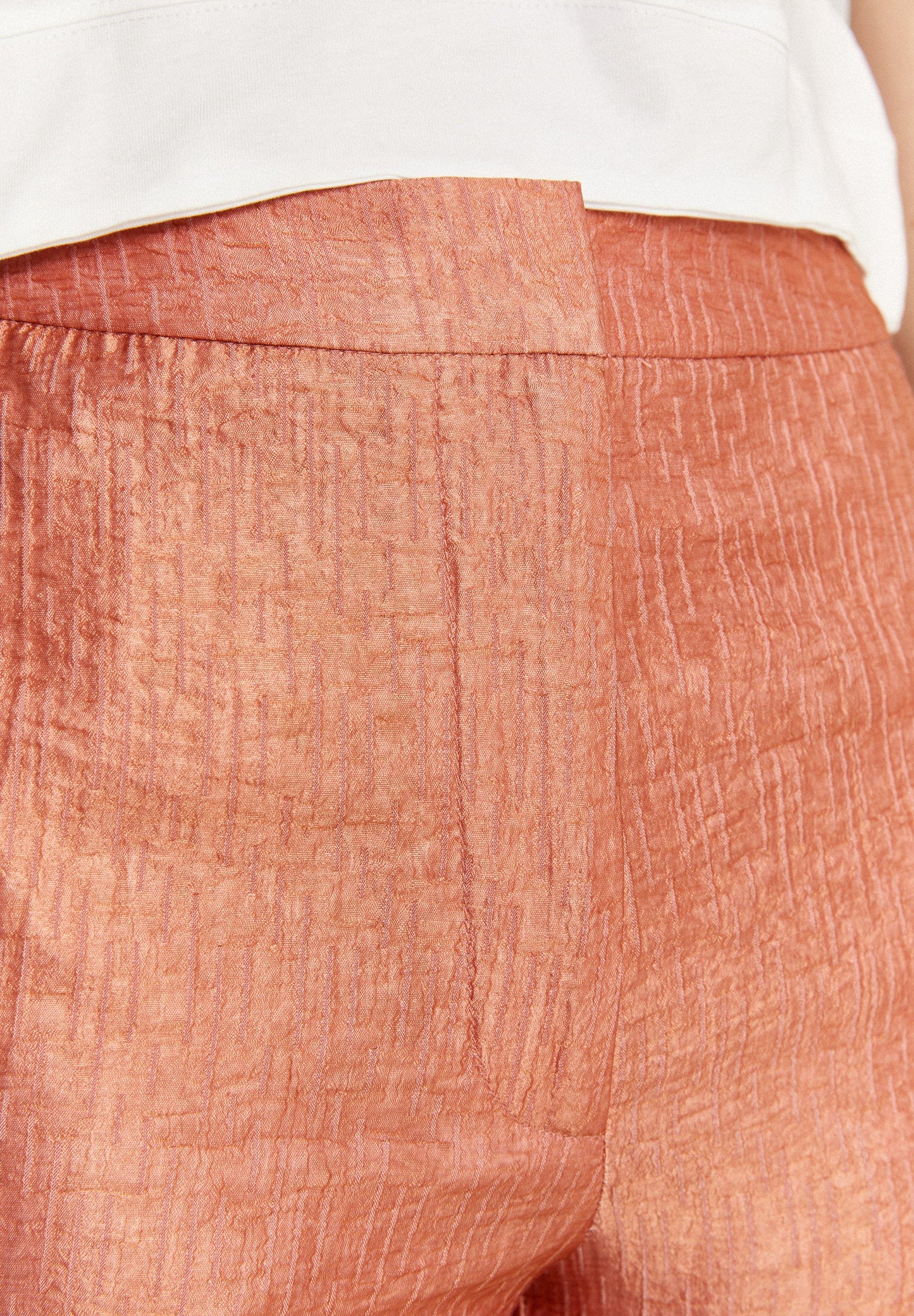 TROUSERS WITH WAVED HEM