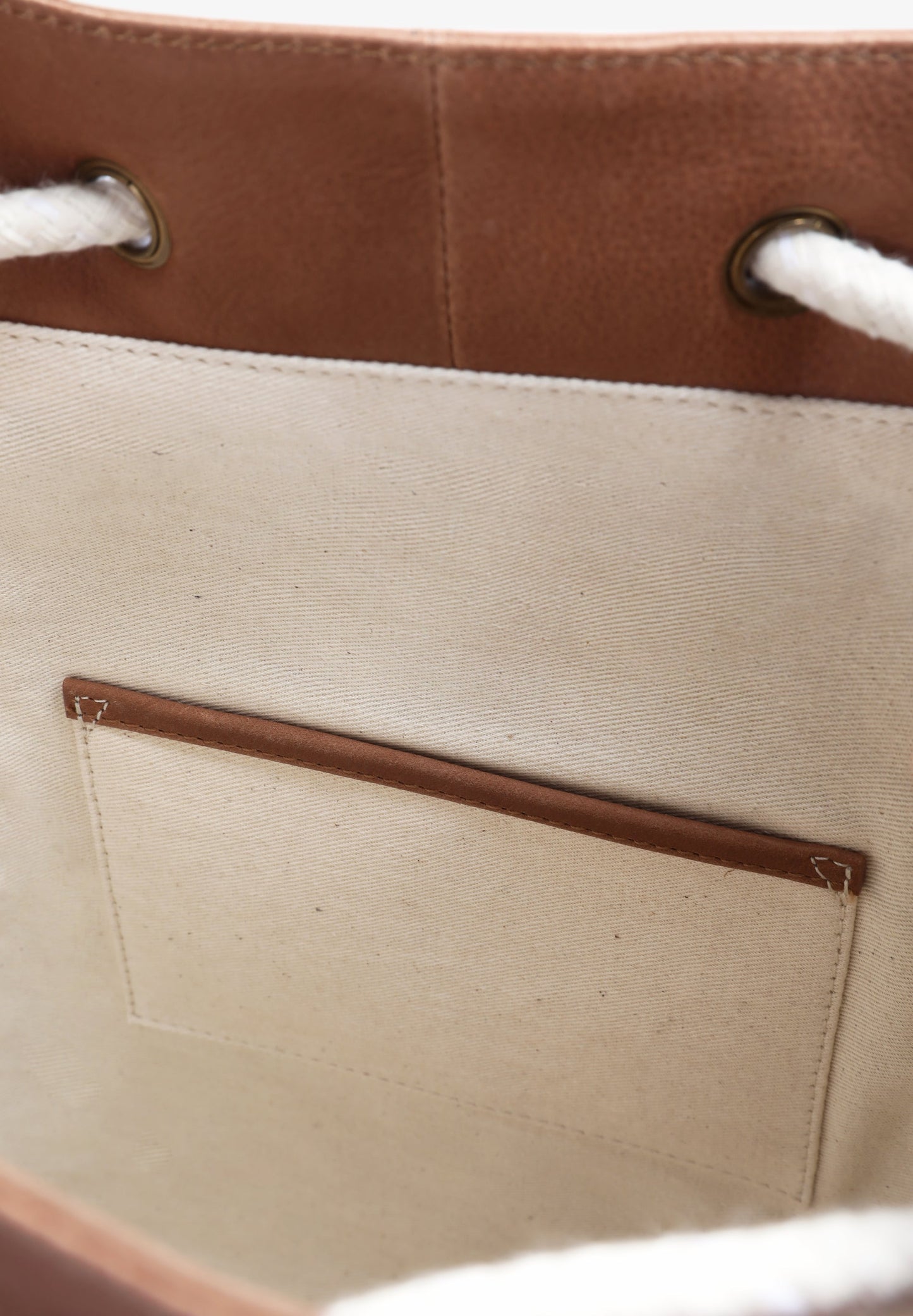 LEATHER BUCKET BAG WITH DRAWSTRING DETAIL