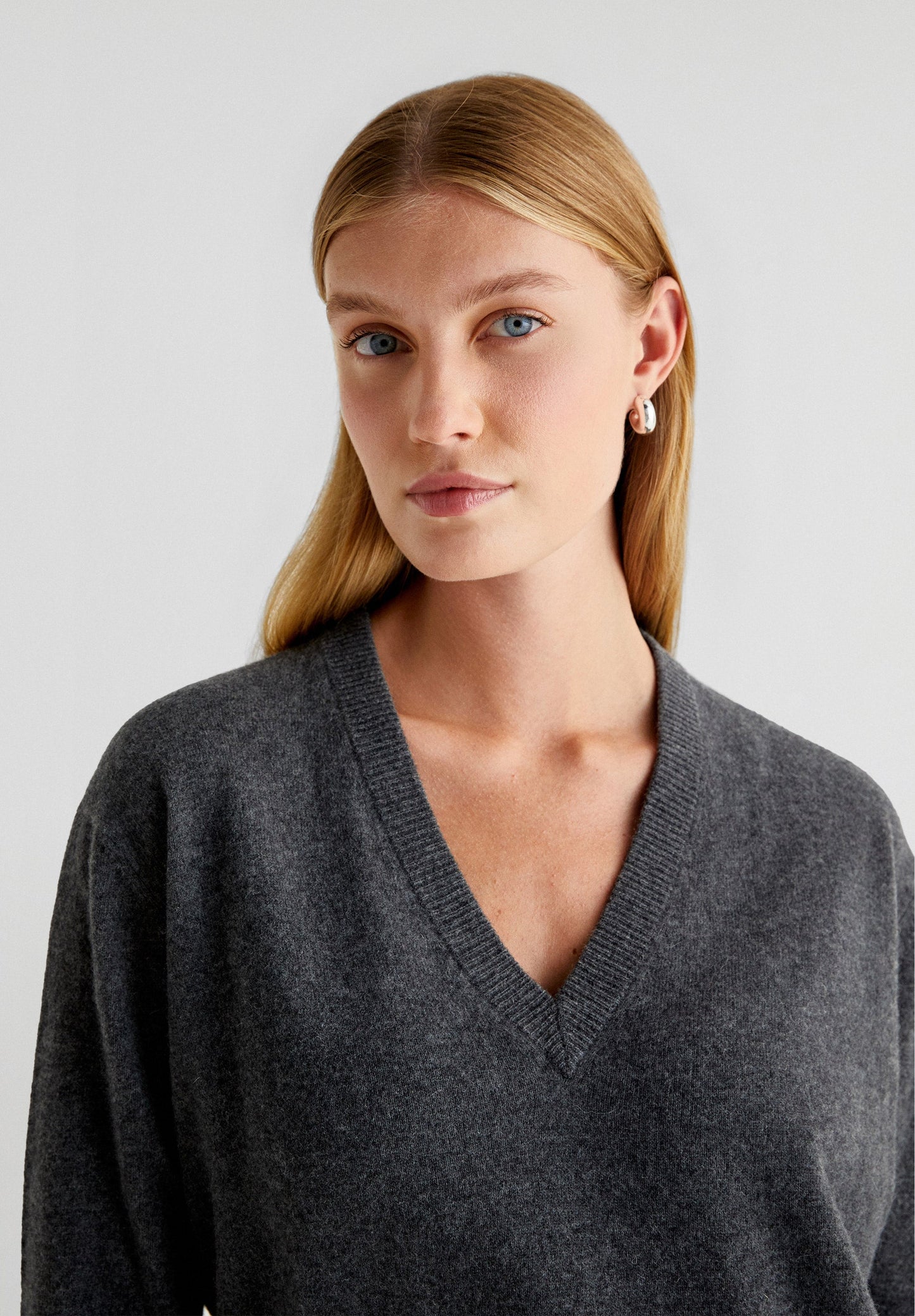 V-NECK SWEATER WITH POCKETS