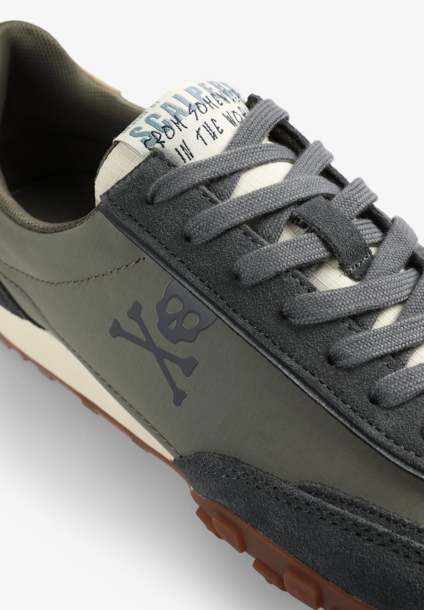 LOW SNEAKERS WITH SKULL PRINT