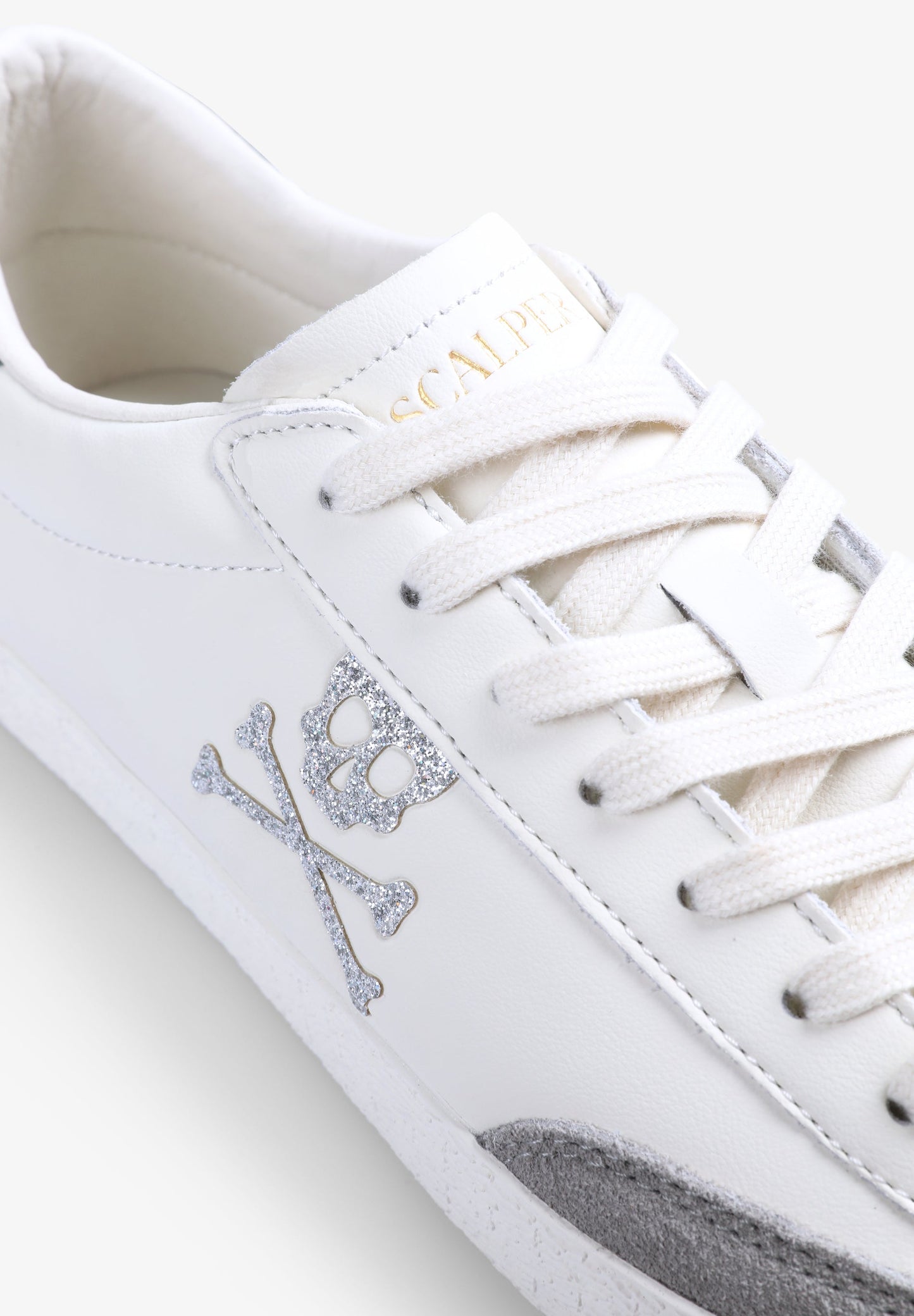 LOW TOP SNEAKERS WITH SIDE SKULL