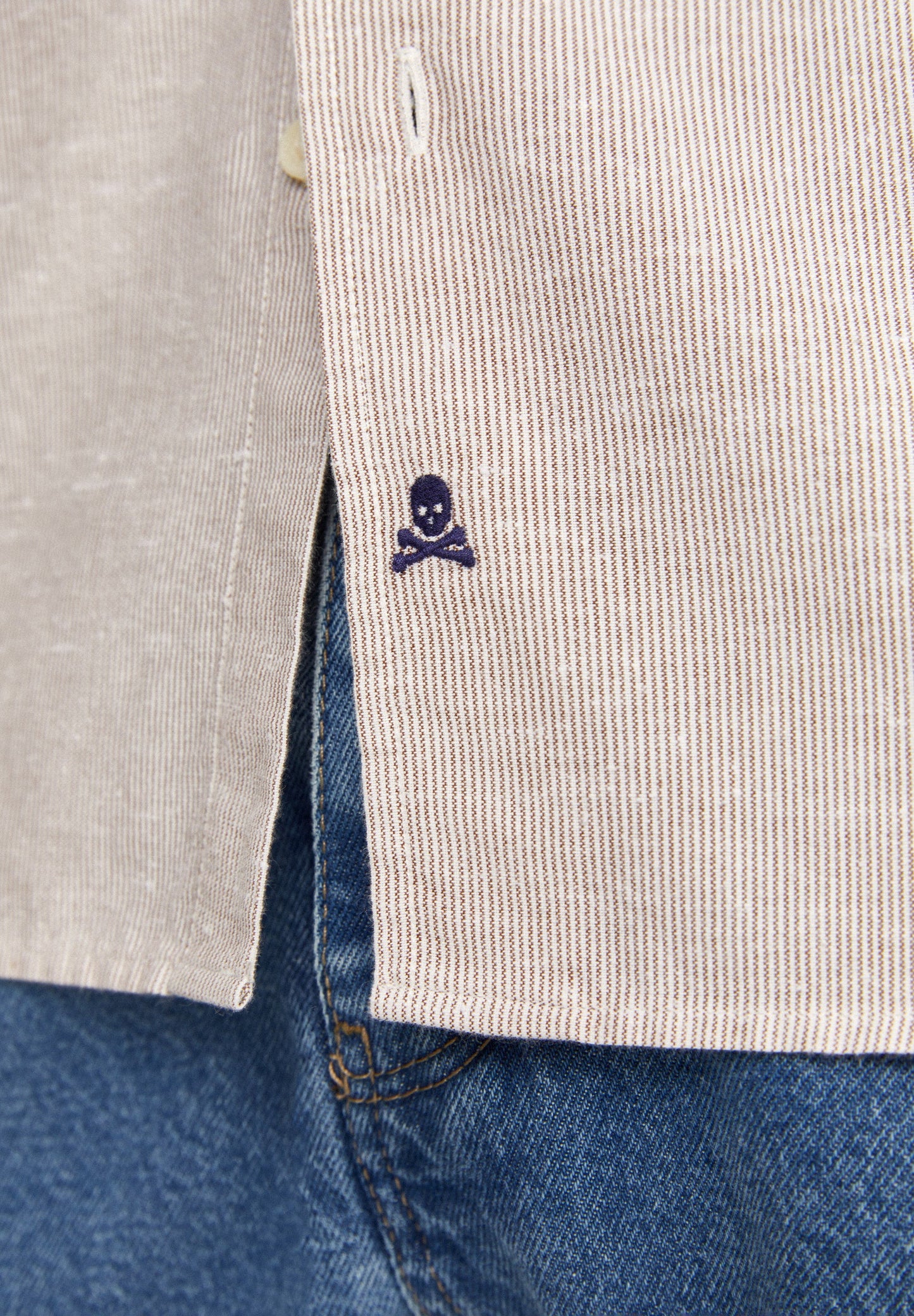 STRIPED SHIRT WITH SKULL AND FLAP