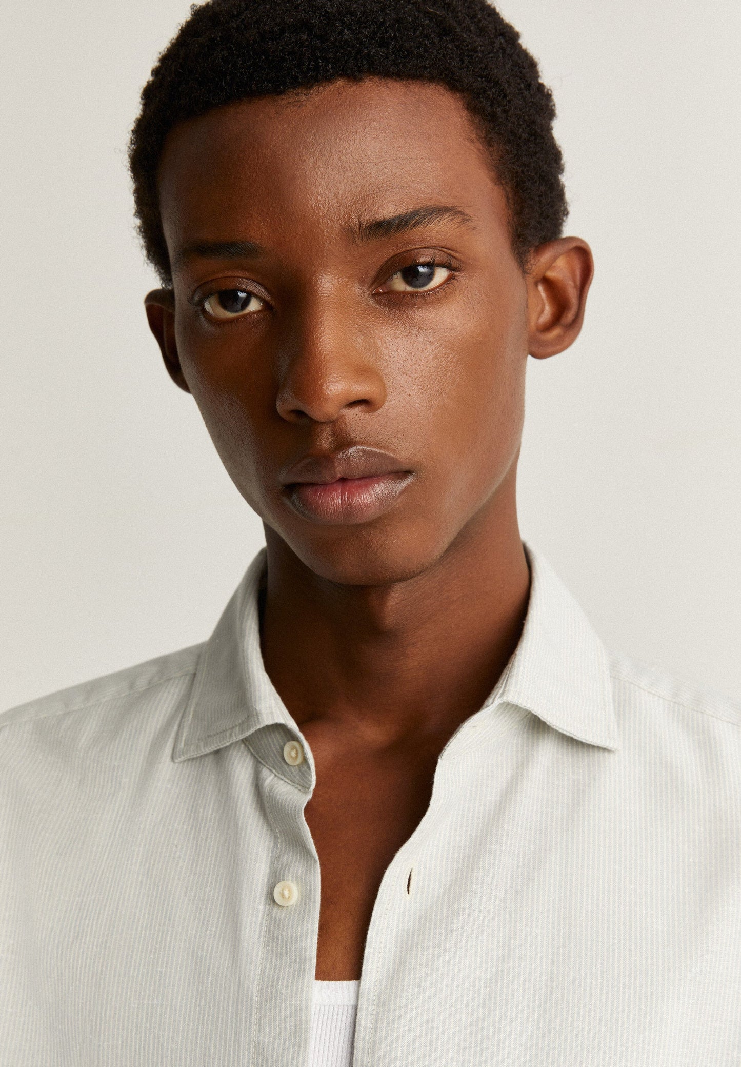 STRIPED SHIRT WITH SKULL AND PLACKET