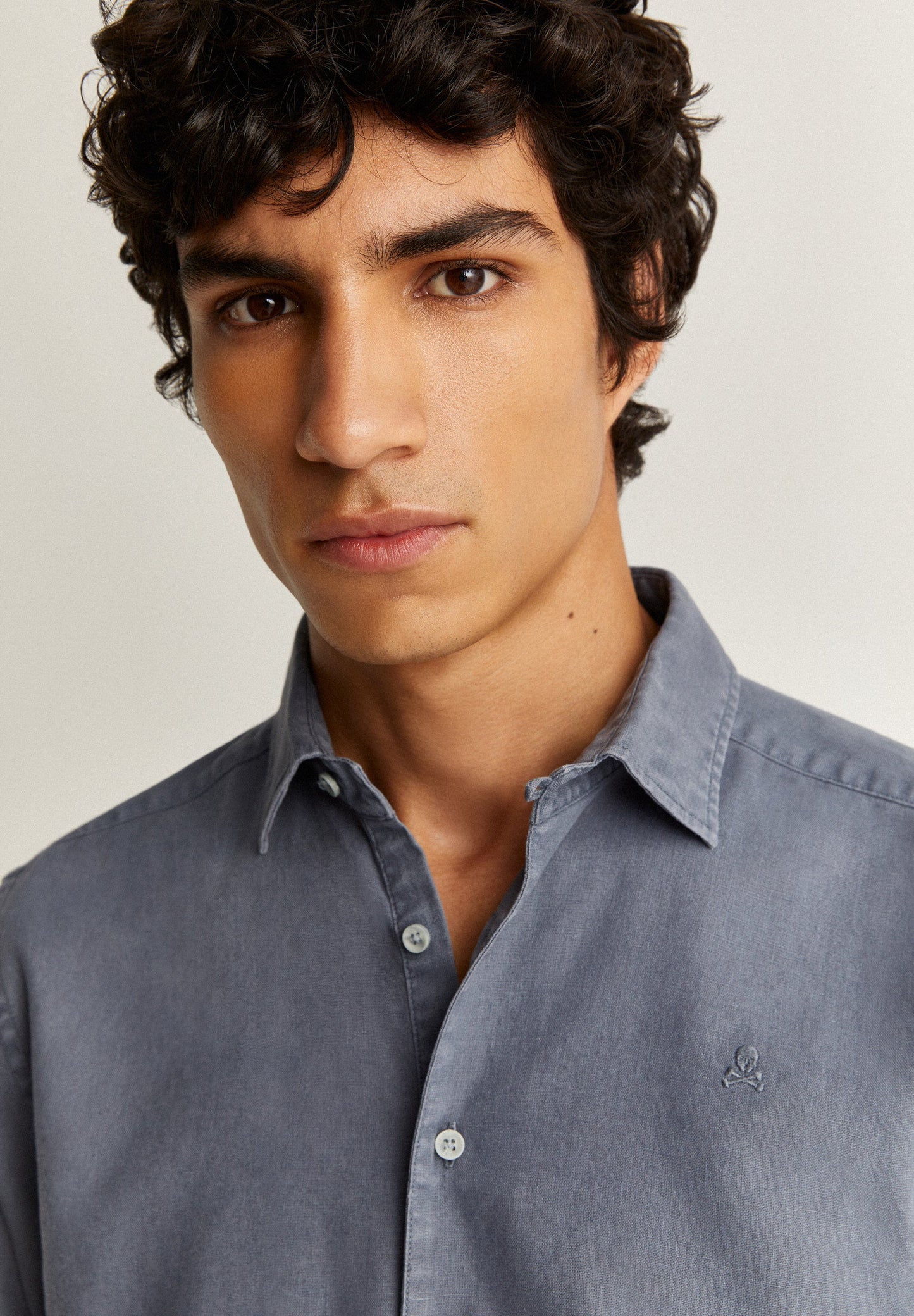 POLO SHIRT WITH EMBROIDERED SKULL