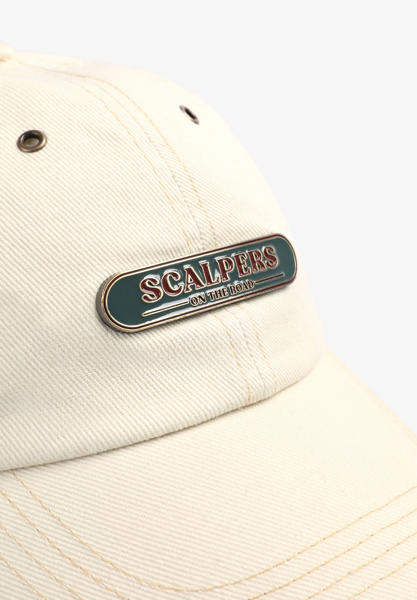 CAP WITH METAL PLATE