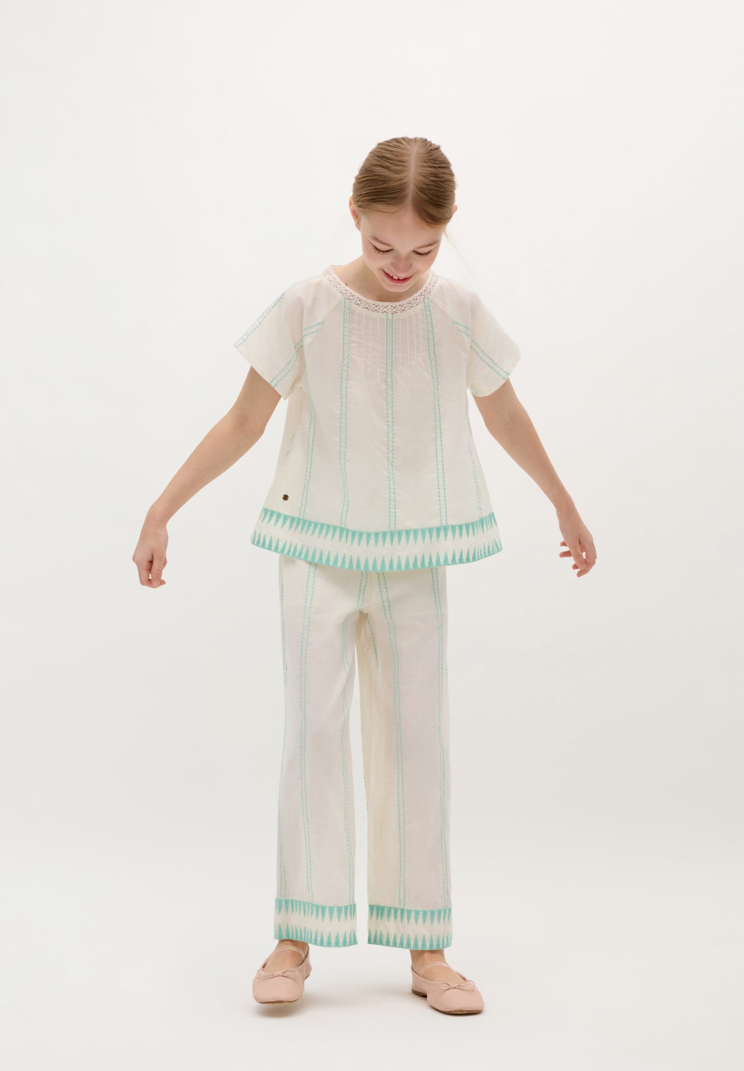 TROUSERS WITH CONTRAST EMBROIDERY DETAILS