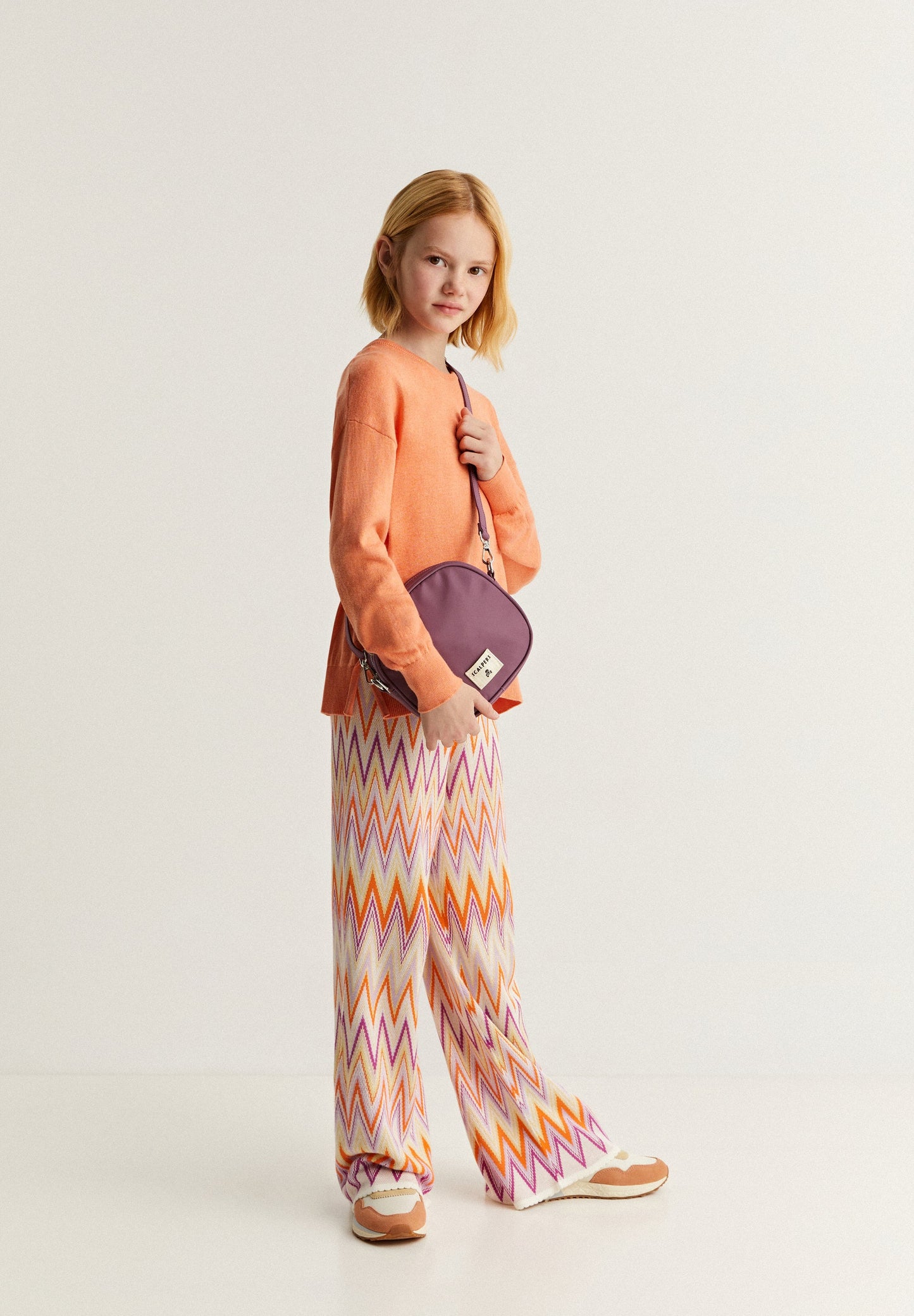 ZIGZAG KNITTED TROUSERS WITH HEM DETAIL