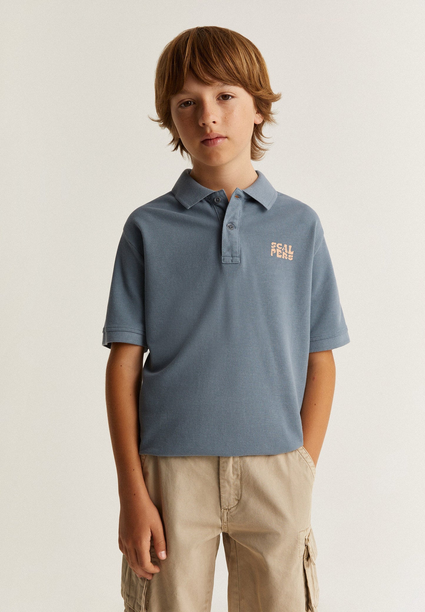 POLO WITH SKULL PATCH