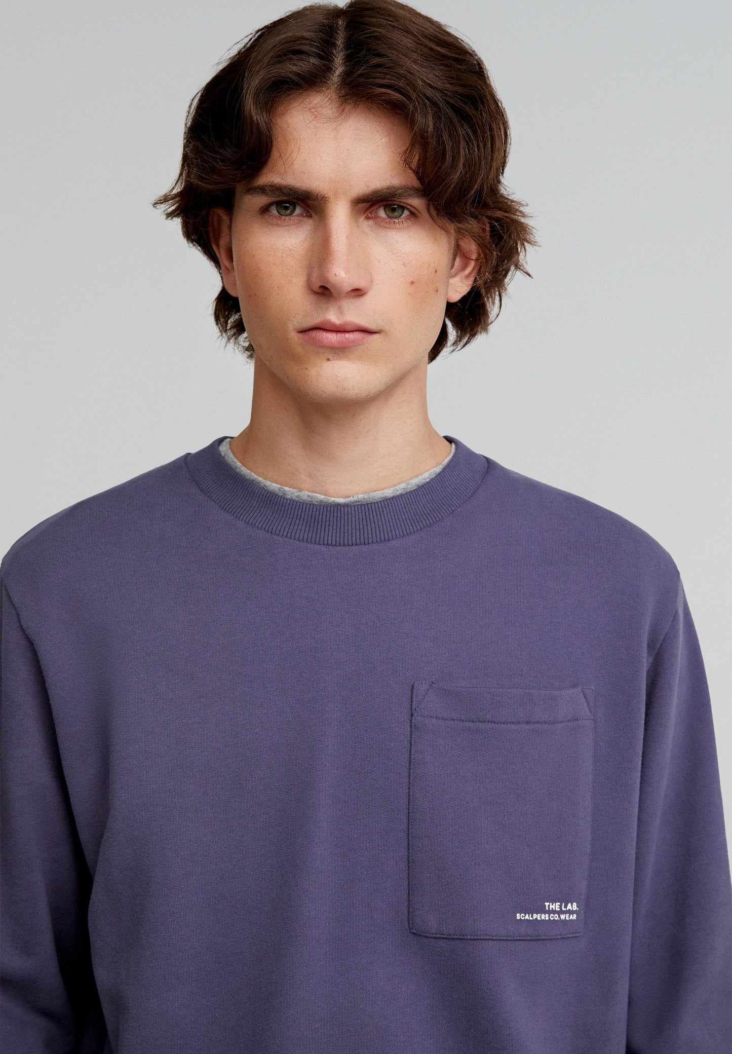 CHEST POCKET SWEATSHIRT