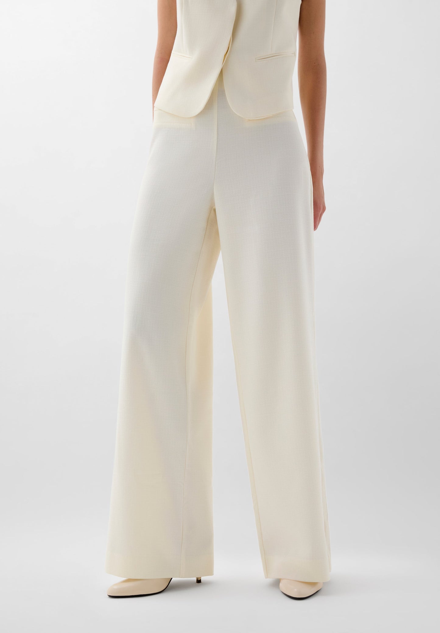 FLOWING TROUSERS WITH POCKETS